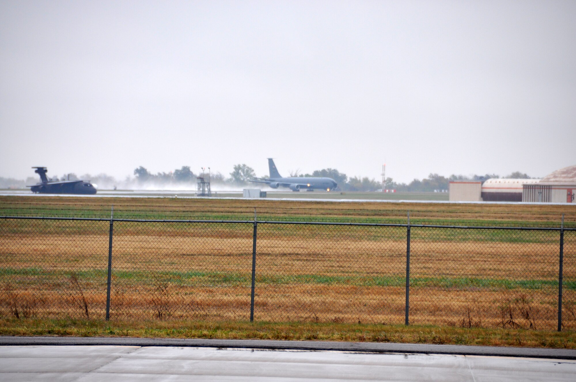 A 507th Air Refueling Wing KC-135 Stratotanker  leaves a water trail in its wake as it takes off in support of an ongoing exercise.  Pilots and boom operators from the 465th Air Refueling Squadron as well as maintenance personnel from the 507th Air Refueling Wing from Tinker Air Force Base Okla. have been launching and recovering aircraft for several days in support of the joint service exercise.  (U.S. Air Force photo/Senior Airman Mark Hybers)