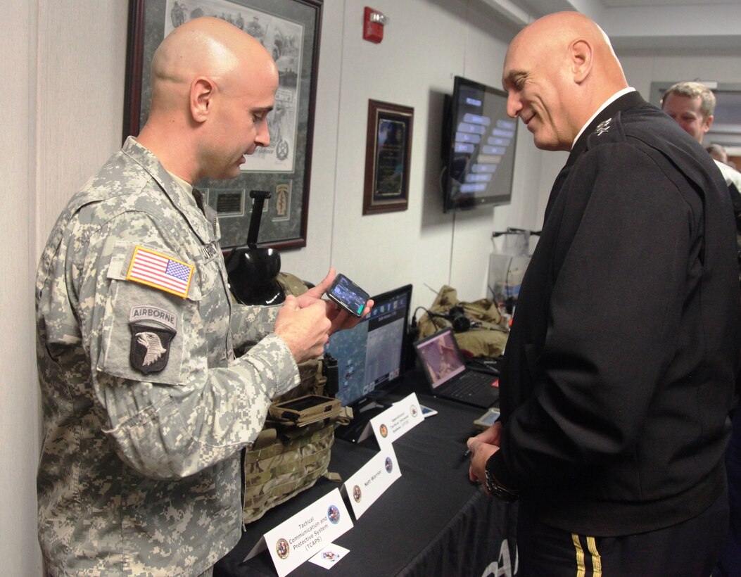 U.S. Army Capt. Paul E. Cluverius briefs Nett Warrior to Gen. Ray Odierno, chief of staff of the Army at Fort Belvoir, Va., Nov. 1, 2013. Odierno visited Program Executive Office Soldier to see the future of Army equipment. (PEO Soldier courtesy photo)