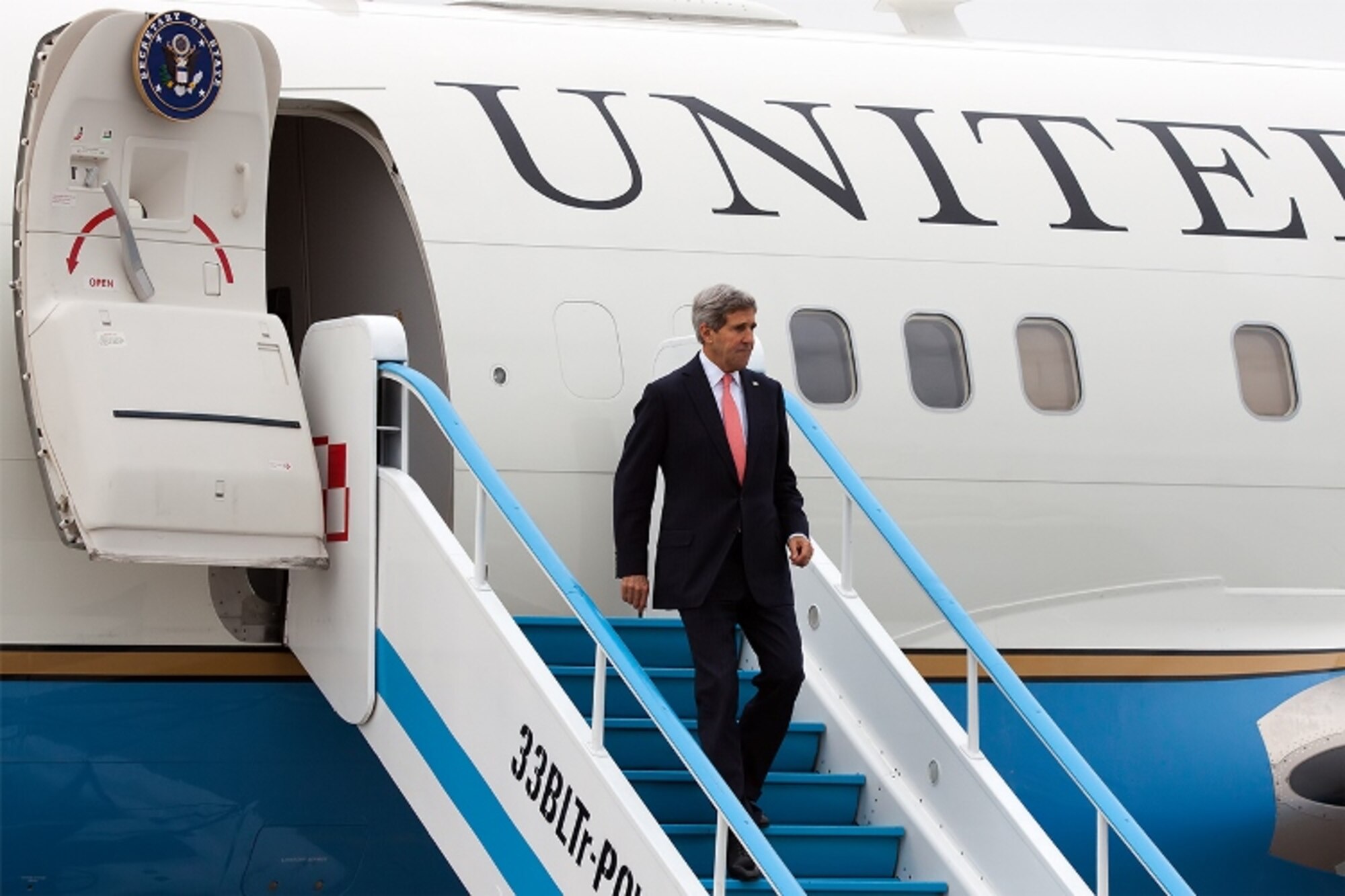 LASK AIR BASE, Poland -- U.S. Secretary of State John Kerry visits Airmen from Detachment 1, 52nd Operations Group, Nov. 5, 2013. The Av-Det is part of the  increased cooperation effort between U.S. and Polish air forces to enhance allied air power. (Photo by Polish Warrant Officer Class 2 Rafał Olejniczak/Released)