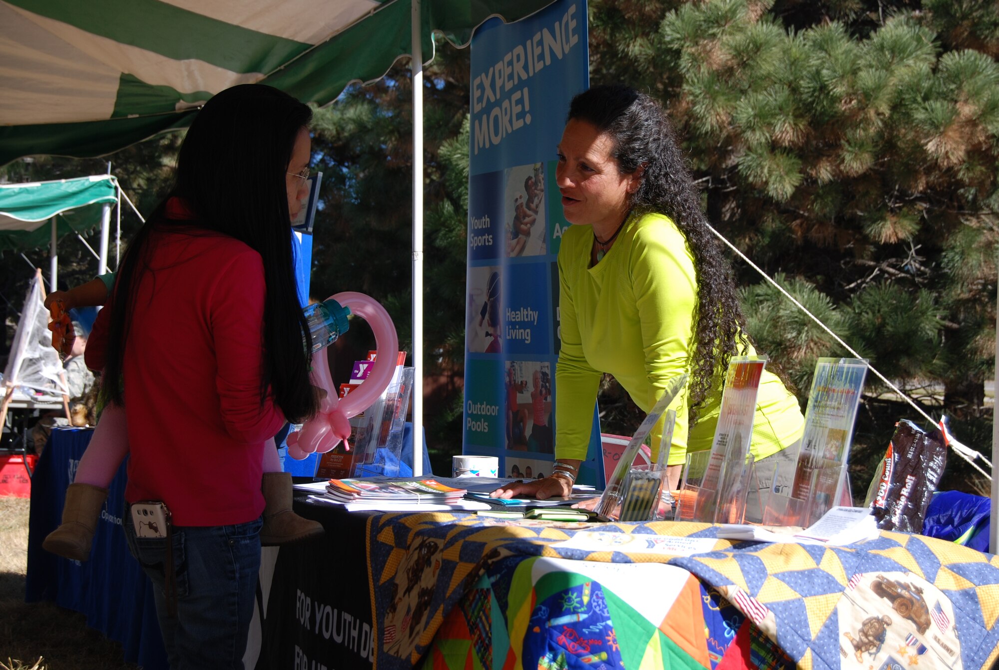 PETERSON AIR FORCE BASE, Colo. – Airmen and their families took part in spooky and educational festivities at the third annual Fall Outreach hosted by the 21st Medical Group Oct. 31. Participants took part in activities including face-painting, learning about germs using a black light and burning energy in the bouncy house while parents had access to a number of booths setup by local organizations, all with the goal of promoting healthy living. (U.S. Air Force photo/Michael Golembesky)