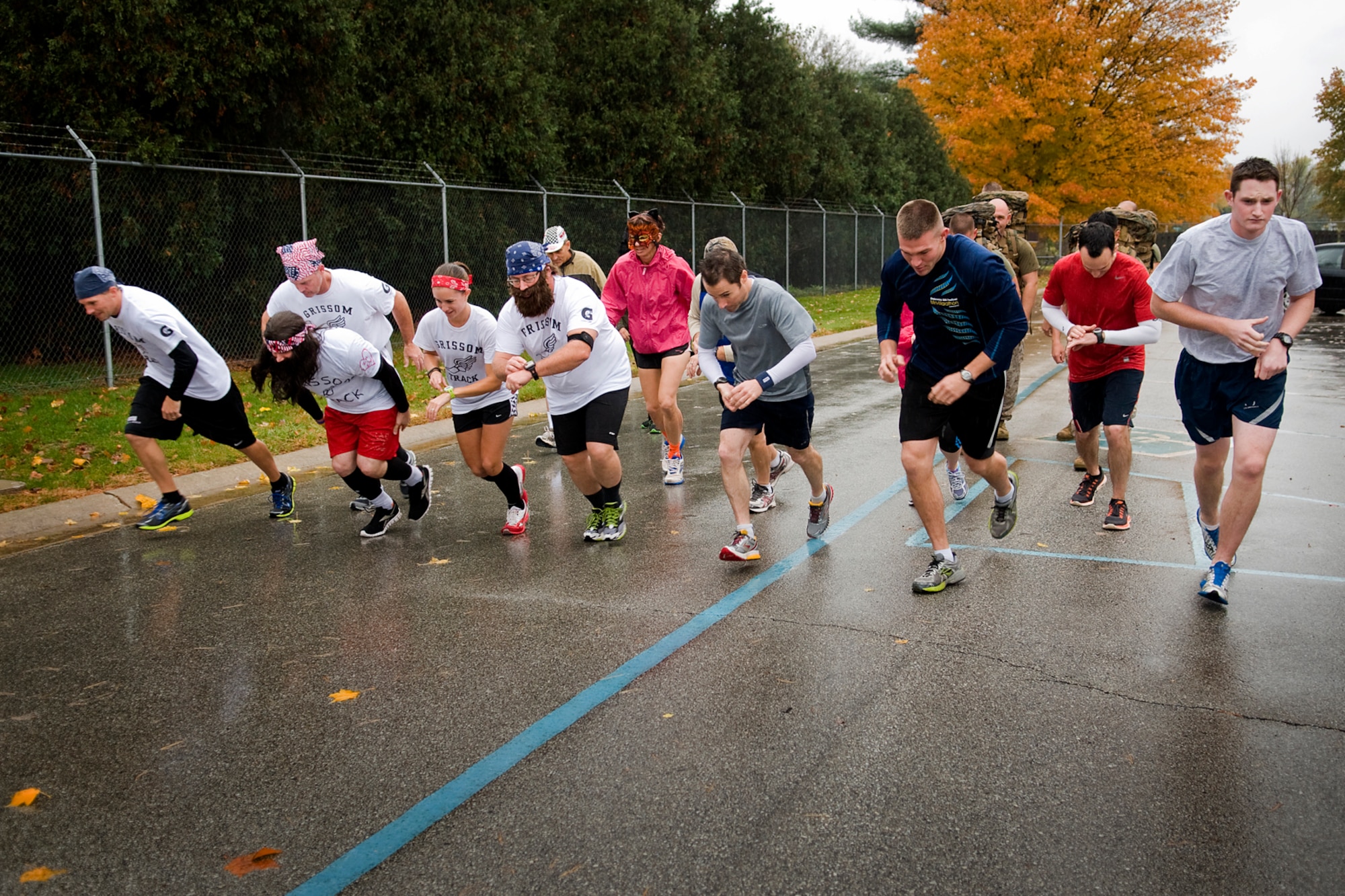 U.S. Air Force and Marine Corps personnel start a 'Grissom Ghouls 5K' at Grissom Air Reserve Base, Ind., Oct. 31, 2013. Many of the participants dressed up in costume to make the race more fun and seasonal. (U.S. Air Force photo/Tech. Sgt. Mark R. W. Orders-Woempner) 
