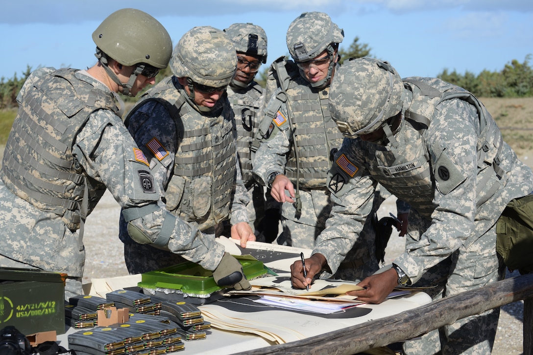 From right to left, U.S. Army Sgt. 1st Class Kevin Hamilton, Lt. Col ...