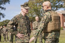 MARINE CORPS BASE CAMP LEJEUNE, N.C. (Nov. 5, 2013) - Lt. Gen. Richard T. Tryon, Commander, U.S. Marine Corps Forces Command, welcomes Col. Matthew G. St. Clair, Commanding Officer, 26th Marine Expeditionary Unit, home after a nine month long deployment. The last year had been a busy one for the 26th MEU, even before their deployment, they took part in Super Storm Sandy relief efforts, providing generators, fuel, clean water and helicopter capabilities. During their deployment, the 26th MEU moved between the Sixth and Fifth Fleet’s area of operations participating in numerous operations around the Mediterranean.  
Tryon took the time to personally show his appreciation for and congratulate St. Clair on a successful deployment.
“MEUs continue to demonstrate the versatility and flexibility of the Navy, Marine Corps team,” said Tryon. “They meet The Commandant’s mandate to be prepared to respond to today’s crisis with today’s forces, today.”