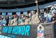 Service members, past and present, wave as they are announced prior to the start of a Carolina Panthers game Nov. 3, 2013 at Bank of America Stadium in Charlotte, N.C. The National Football League paid tribute to military members by offering them free seats to the football game. 