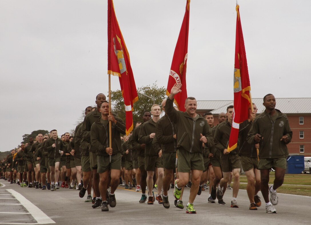 Maj. Gen. Robert F. Hedelund (Left), the commanding general of 2nd Marine Aircraft Wing, and Sgt. Maj. Christopher G. Robinson (Right), the 2nd MAW sergeant major, lead a motovational run in commemoration of the Marine Corps' 238th birthday. After talking with the troops about the Corps' illustrious history Hedelund reminded the Marines of the courage and tenacity the Marines of past generations displayed, especially during the Bougainville Campaign. "As we are standing here today, we have inherited the tradition of hard fought victory that stays with us as a part of our ethos," he said. 