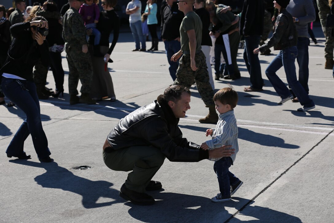 Capt. Andrew D. Kingsbury greets his son upon his arrival back to Cherry Point Nov. 3. Kingsbury is a UH-1N weapons and tactics instructor with VMM-266 (Rein.).


