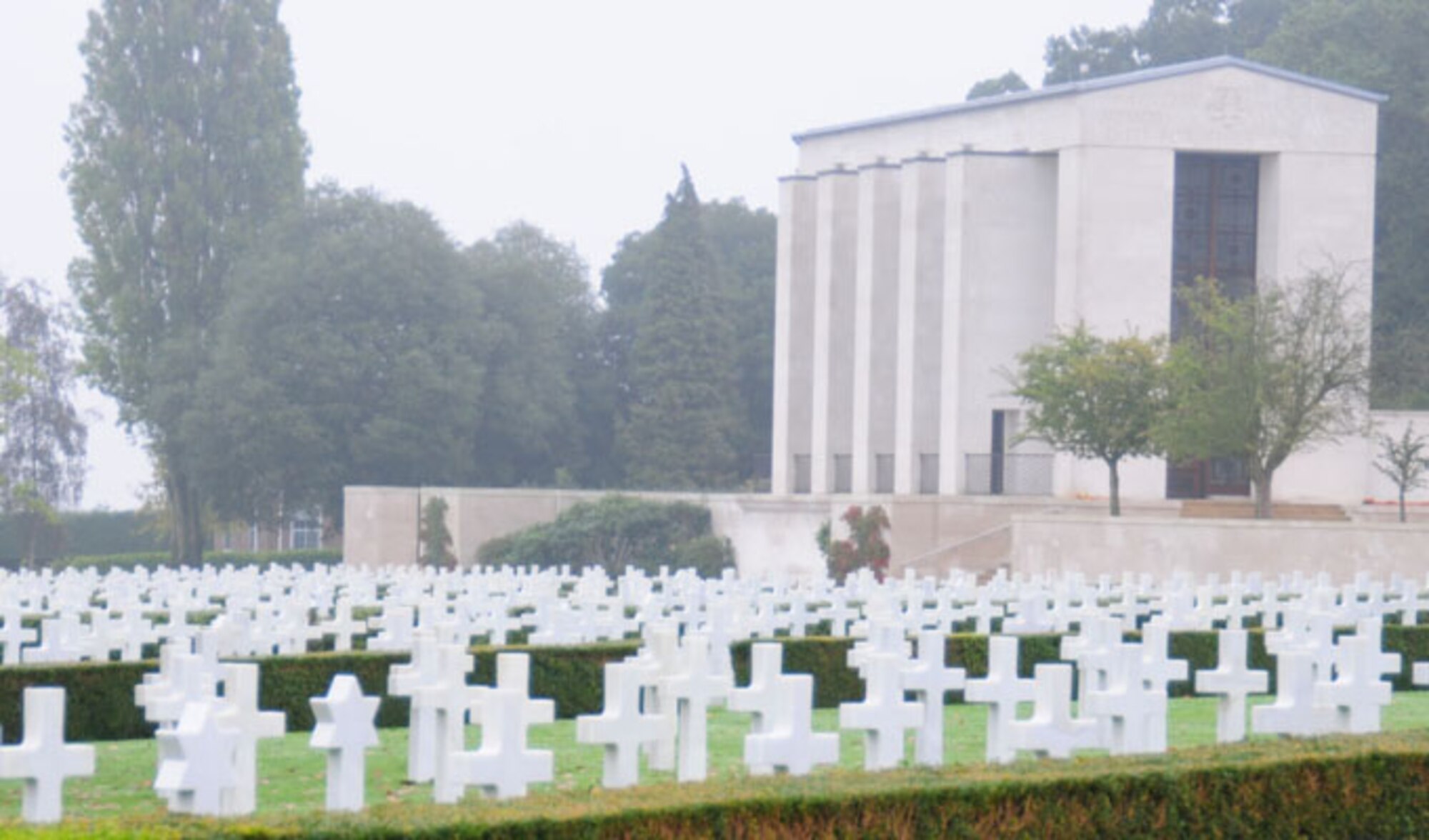 Headstones made of Lasa marble line the grounds of Madingley American Cemetery Oct. 16, 2013, at Madingley, England. Each grave contains the body or identifiable remains of the named individual on the headstone, with the exception of 24 unknown service members. The 3,812 graves make up approximately 39 percent of the original total of Americans temporarily interred in the United Kingdom during World War II. Sixty percent were repatriated at the wishes of family and next of kin.