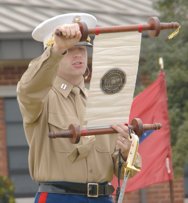 Capt. Michael T. Duffy, adjutant, Marine Corps Logistics Base Albany, reads the 13th commandant Gen. John A. Lejeune’s birthday message Wednesday during the Marine Corps’ 238th birthday cake-cutting ceremony and uniform pageant held in front of Building 3500, here. Marines, civilian-Marines and guests, gathered for the traditional ceremony to celebrate 238 years of service to the nation.