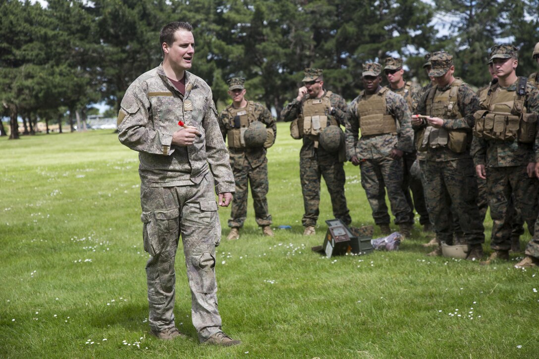 New Zealand Army Cpl. Tango Anderson, left, a reconnaissance detachment commander with 1st
Royal New Zealand Infantry Regiment, gives a safety brief for training grenades to U.S. Marines during a familiarization training in preparation for exercise Southern Katipo (SK13), aboard Linton Military Camp, Linton, New Zealand, Nov. 4, 2013. SK13 is a New Zealand led training exercise to enhance interoperability between coalition forces and to help the New Zealand Defence Force further develop their amphibious capabilities. (U.S. Marine Corps photo by Cpl. Luis A. Vega 1st Marine Division Combat Camera/Released)