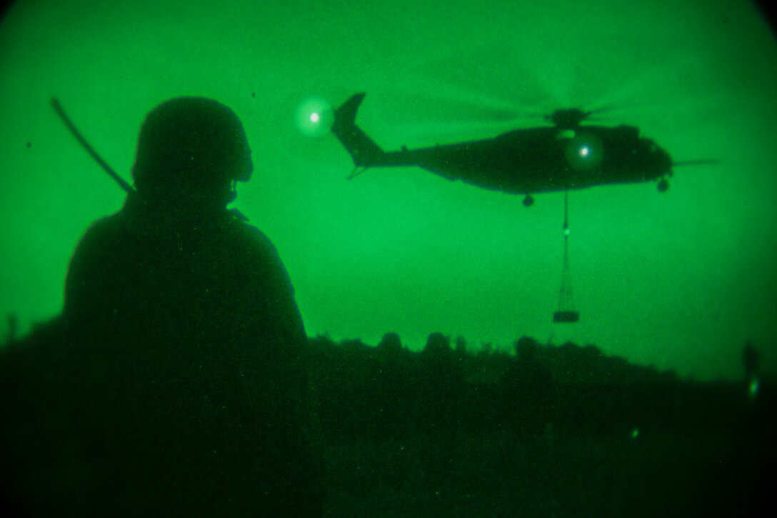 A CH-53E Super Stallion with Marine Medium Tiltrotor Squadron 265 (Reinforced), 31st Marine Expeditionary Unit, moves heavy cargo during external lift training here, Oct. 31. External lifts move large cargo from one place to another via helicopter when rough terrain prevents the load from being transported by ground or when the cargo has to move from ship to shore quickly. With the 36,000 pound lift capability of the Super Stallion, this capability can provide transportation for anything from M777A2 Lightweight Howitzers to a pallet of Meals Ready-to-Eat. The 31st MEU is the Marine Corps’ force in readiness in the Asia-Pacific region and is the only continuously forward deployed MEU. 