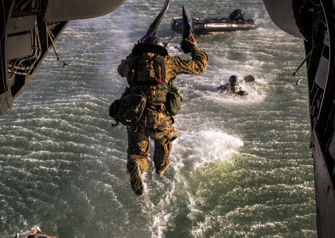 Marines and sailors in the Basic Reconnaissance Course practice their helocasting skills at Naval Amphibious Base Coronado and in San Diego Bay on Nov. 6. These students have been training to become reconnaissance Marines and are half-way through the course. The 12 week training evolution provides the students with the basic knowledge of reconnaissance doctrine, concepts, and techniques with emphasis on amphibious entry, extraction, beach reconnaissance, Combat Rubber Reconnaissance Craft (CRRC) operator skills and ground reconnaissance patrolling skills. 