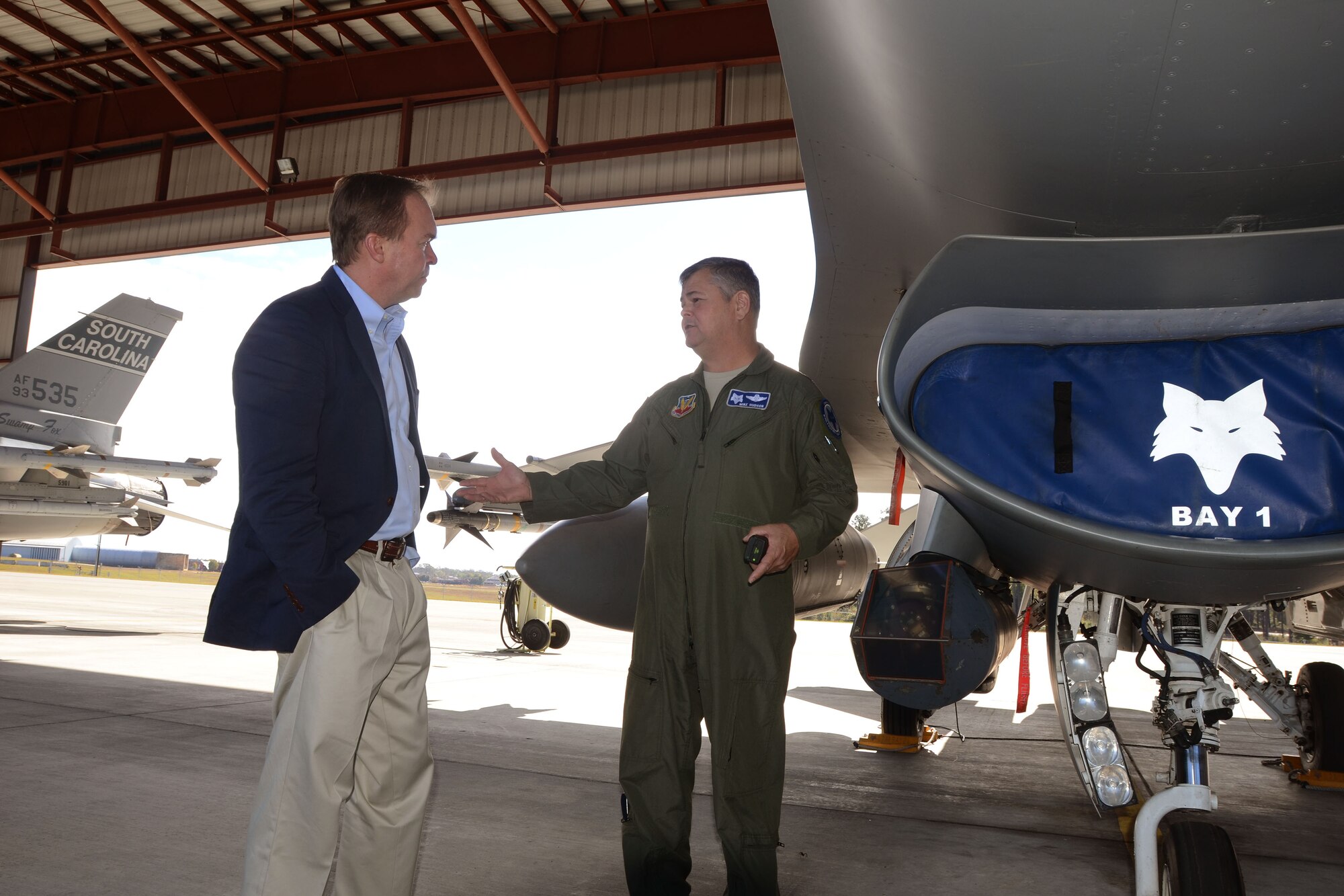 U.S. Air Force Brig. Gen. Michael Hudson, Chief of Staff of the South Carolina Air National Guard, discusses the air superiority capabilities of the F-16 aircraft assigned to the 169th Fighter Wing and the homeland defense mission of the 169th Aerospace Control Alert unit, Nov. 6, 2013. Military leaders of the South Carolina Air National Guard at McEntire Joint National Guard Base hosted a visit to Congressman Mick Mulvaney, U.S. Representative for South Carolina's 5th Congressional District, and to members of the S.C. Military Base Task Force, William L. Bethea, Jr., Chairman of the MBTF, and Charlie Farrell. (U.S. Air National Guard photo by Senior Master Sgt. Edward Snyder/Released)  