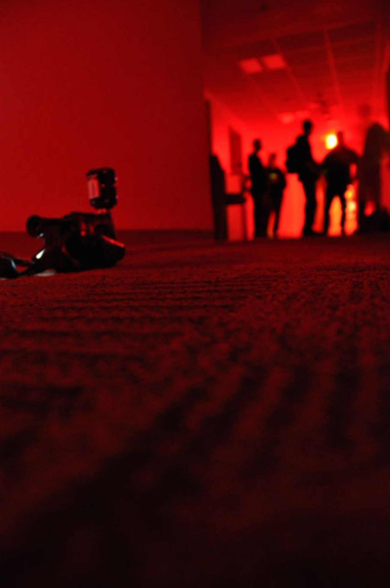 A full-spectrum video camera records as it sits on the floor of a building on March Air Reserve Base, Califl, where Senior Airman Jose Mora, 452nd Aerospace Medicine Squadron, and a small team of assistants, conduct a parnormal investigation April 20, 2013. Mora teamed with Senior Airman Mathieu Beaulieu, 912th Air Refueling Squadron, and the two have done many investigations together this year. (U.S. Air Force photo/Linda Welz)