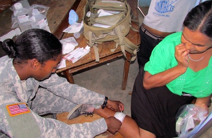 Members of Joint Task Force-Bravo's Medical Element (MEDEL) partnered with the Honduran Ministry of Health and the Honduran military to provide medical care to more than 1,200 people in the villages of Plan de Leones and Cuesta de la Virgen in the department of Comayagua, Honduras, during a Medical Readiness Excercise (MEDRETE), Nov. 4-6, 2013.  (Courtesy photo)