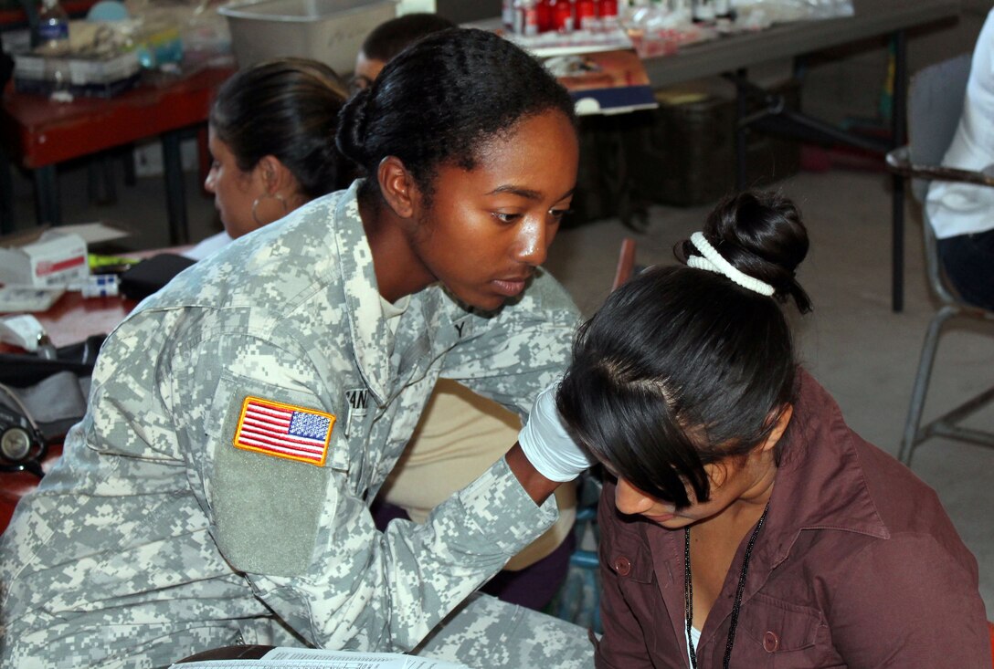 Members of Joint Task Force-Bravo's Medical Element (MEDEL) partnered with the Honduran Ministry of Health and the Honduran military to provide medical care to more than 1,200 people in the villages of Plan de Leones and Cuesta de la Virgen in the department of Comayagua, Honduras, during a Medical Readiness Excercise (MEDRETE), Nov. 4-6, 2013.  (Courtesy photo)