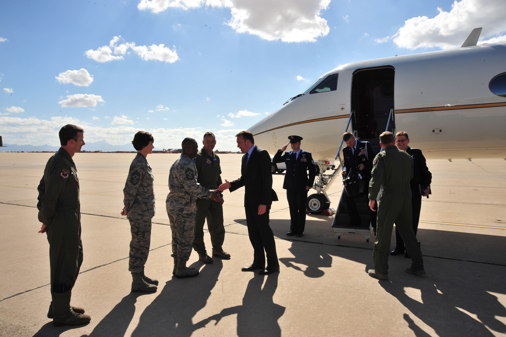 Acting Secretary of the Air Force Eric Fanning is greeted by 12th Air Force and 355th Fighter Wing senior leaders during a familiarization tour at Davis-Monthan Air Force Base, Ariz., Nov. 5, 2013.  During his visit, Fanning learned more about Air Forces Southern, the Desert Lightning mission and its tenant units. (U.S. Air Force photo/SrA Joshua Slavin)(Released)