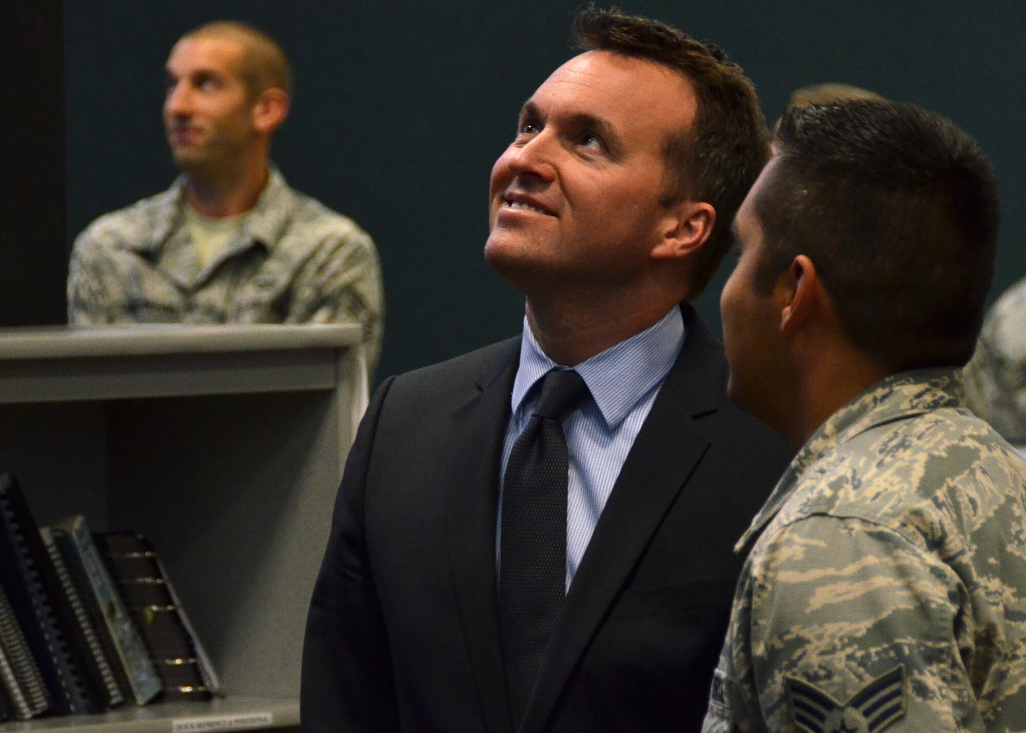 Acting Secretary of the Air Force Eric Fanning watches a real-time display of U.S. military aircraft movements in South America during a visit to the 612th Air and Space Operations Center at Davis-Monthan Air Force Base, Ariz., Nov. 5, 2013. The 612th AOC provides command and control of U.S. military aircraft operating in Central America, South America and the Caribbean. (U.S. Air Force photo/Capt. Justin Brockhoff) (Released)