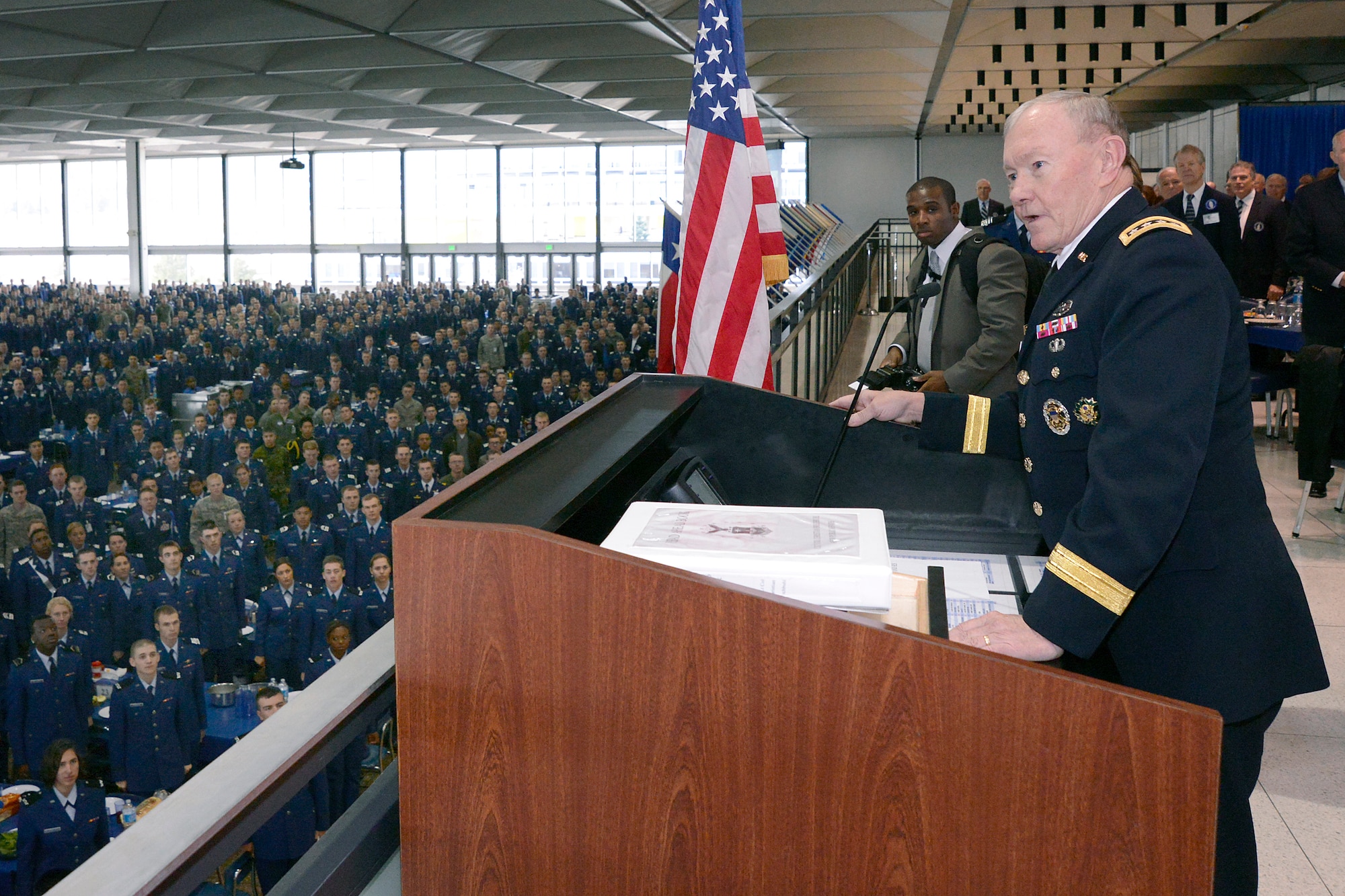 Gen. Martin E. Dempsey, the Chairman of the Joint Chiefs of Staff, speaks to Academy cadets in Mitchell Hall Nov. 1. Dempsey spoke to hundreds of first- and- second class cadets here on the importance of upholding character, trust and faith in the military profession. 