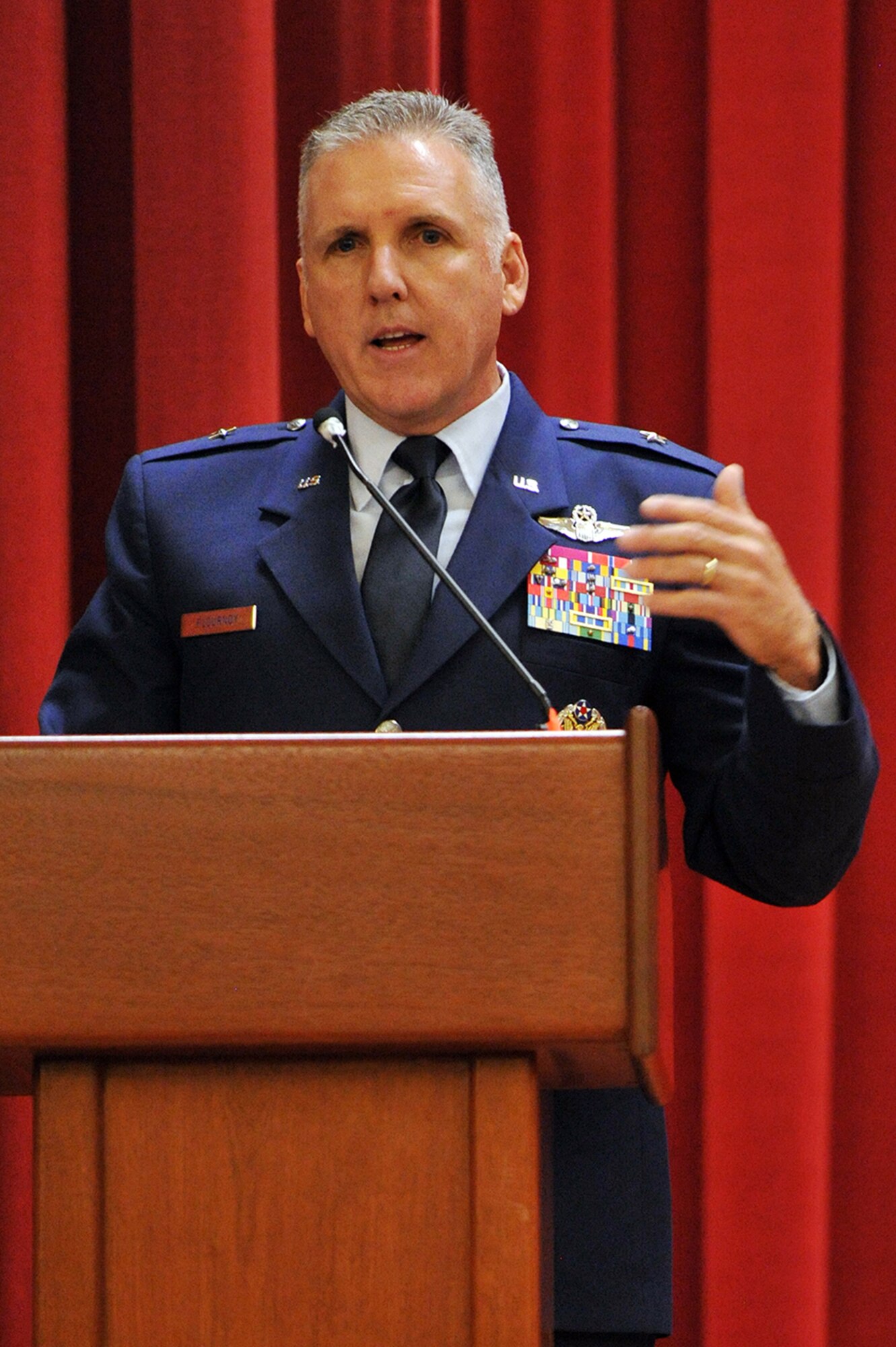 Brig. Gen. John C. Flournoy Jr., addresses his troops at Headquarters, 4th Air Force, March Air Reserve Base, Calif., for the first time as their commander after his assumption of command ceremony there Sunday, Nov. 3, 2013. Flournoy arrives to the Southern California base from Buckley Air Force Base, Colo., where he commanded the Air Reserve Personnel Center. (U.S. Air Force photo/Tech. Sgt. Daniel St. Pierre)