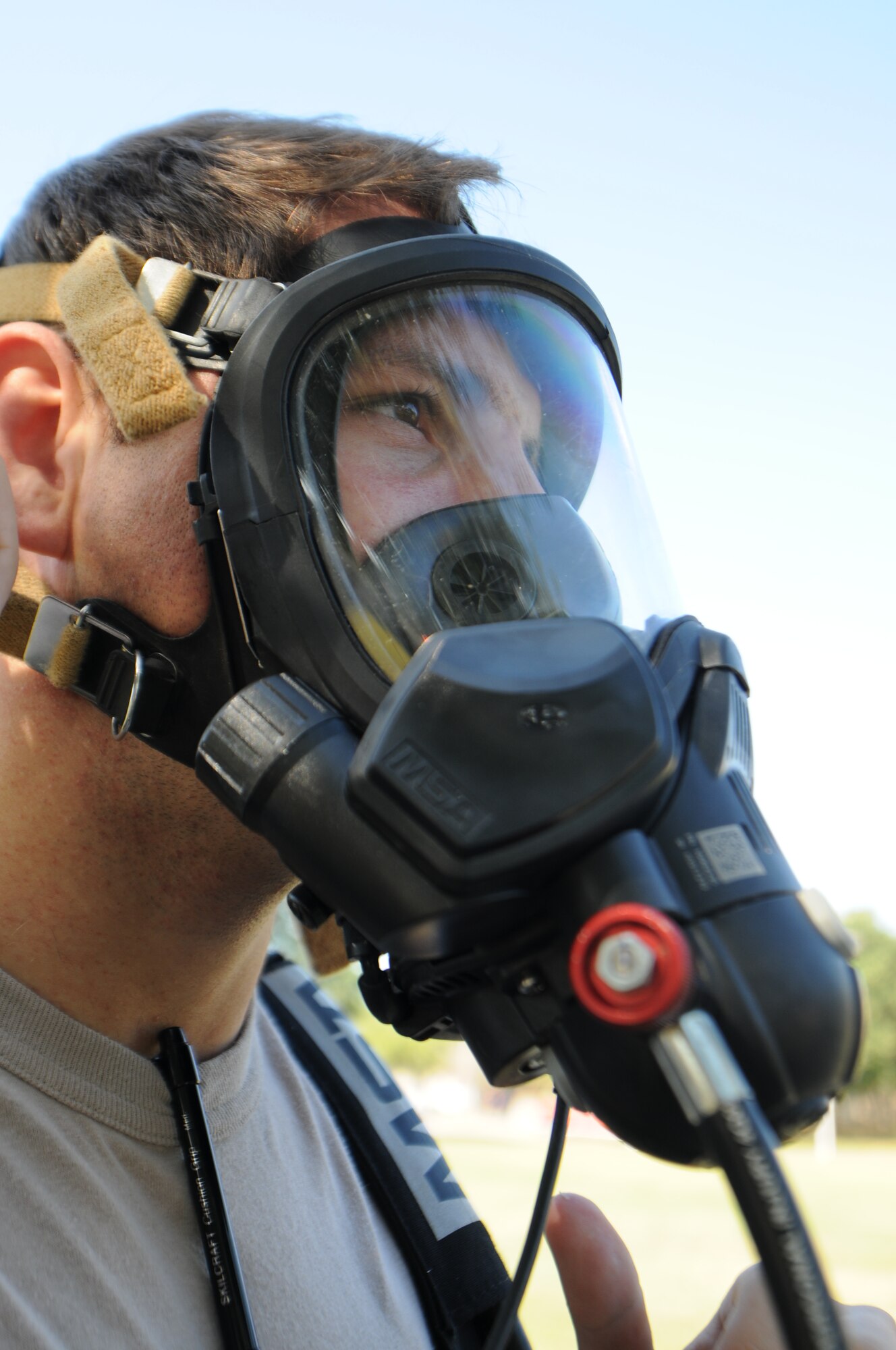 Staff Sgt. Andrew Dailey, 81st Aerospace Medicine Squadron bioenvironmental engineering technician, gives a “thumbs-up” sign for a functional check of self-contained breathing apparatus to be used during a Chemical, Biological, Radiological, Nuclear, and high-yield Explosive exercise scenario Nov. 6, 2013, at Keesler Air Force Base, Miss.  The Force Protection Condition exercise scenario included a suspect posing as a driver making a delivery to the Locker House and spraying a chemical on a group of Airmen as they were assisting him with unloading the packages from the truck.  Immediately, the Airmen simulated receiving eye irritations, excessive sweating, chest pain, choking, and vomiting from exposure to the chemical. (U.S. Air Force photo by Kemberly Groue)