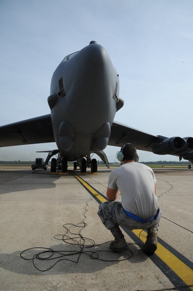 Joshua Chappell, 2nd Aircraft Maintenance Squadron crew chief, waits for the engines on a B-52H Stratofortess to start on Barksdale Air Force Base, La., Oct. 29, 2013. (U.S. Air Force photo/Senior Airman Joseph A. Pagán Jr.)