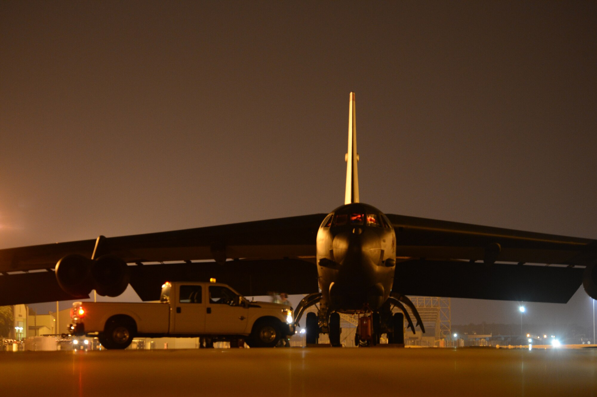 Aircrew from the 20th Bomb Squadron prepare to exit a B-52H Stratofortress on Barksdale Air Force Base, La., Oct. 29, 2013. The aircrew made a simulated emergency landing in an isolated area with no maintenance support around. Once out of the aircraft, aircrew accomplished a post-landing checklist to ensure the security of the aircraft. (U.S. Air Force photo/Senior Airman Micaiah Anthony)
