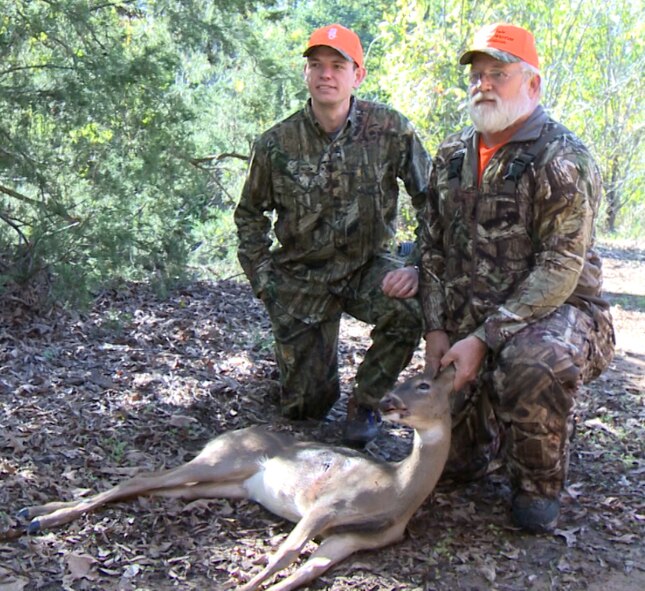 Retired Tech. Sgt. Adam Popp, Explosive Ordnance Disposal, poses with a deer he shot during the Barksdale Wounded Warrior Hunt on Barksdale Air Force Base, La., Nov. 2, 2013. Popp shot the first deer of the two-day hunt on Barksdale. (courtesy photo)