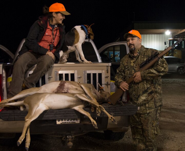 Kevin Parke poses with the deer he brought in during the Barksdale Wounded Warrior Hunt on Barksdale Air Force Base, La., Nov. 2, 2013. Six wounded Explosive Ordnance Disposal technicians from across the military branches, enjoyed a weekend of camaraderie and hunting. The men were joined throughout the weekend by members of the base Natural Resources office, EOD Airmen from the 2nd Civil Engineer Squadron and leadership. (U.S. Air Force photo/Staff Sgt. Amber Corcoran)