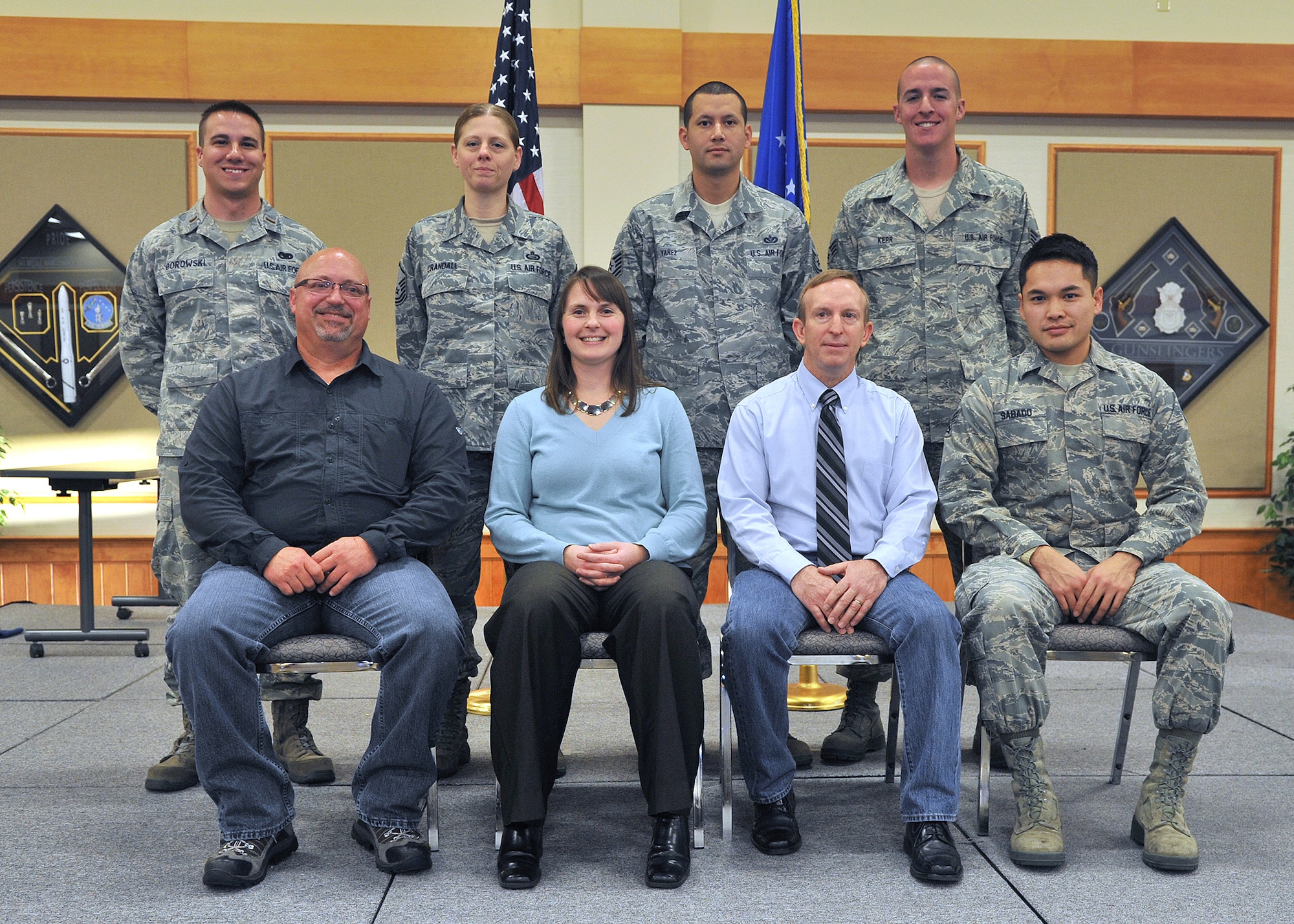 Winners of the third quarter Wing Quarterly Awards pose for a photo at the Grizzly Bend on Oct. 30.  Pictured from left to right are: (back row) Company Grade Officer of the Quarter, 2nd Lt. William Borowski, 341st Mission Support Group; Senior Noncommissioned Officer of the Quarter, Master Sgt. Sherri Crandall, 341st MSG; Noncommissioned Officer of the Quarter, Tech. Sgt. Victor Yanez, 819th RED HORSE Squadron; and Airman of the Quarter, Senior Airman Jeffrey Kerr, 341st MSG.  (Front row) Supervisor Category Two Civilian of the Quarter, John Edmonston, 341st MSG; Non-Supervisor Category Two Civilian of the Quarter, Stephanie Groux, 341st MSG; Non-Supervisor Category One Civilian of the Quarter, Jeffrey Parker, 341st MSG; and Honor Guard Member of the Quarter, Senior Airman Louie Sabado, 12th Missile Squadron.  Not pictured: Supervisor Category One Civilian of the Quarter, Gary Martin, 341st MSG; and Outstanding Dorm Room of the Quarter, Airman 1st Class Heather Parks, 341st Force Support Squadron.  Dorm 735 won Outstanding Dormitory of the Quarter and Malmstrom’s Professional Team of the Quarter went to 341st MSG’s Contracting End-of-Year Team. (U.S. Air Force photo/John Turner)
