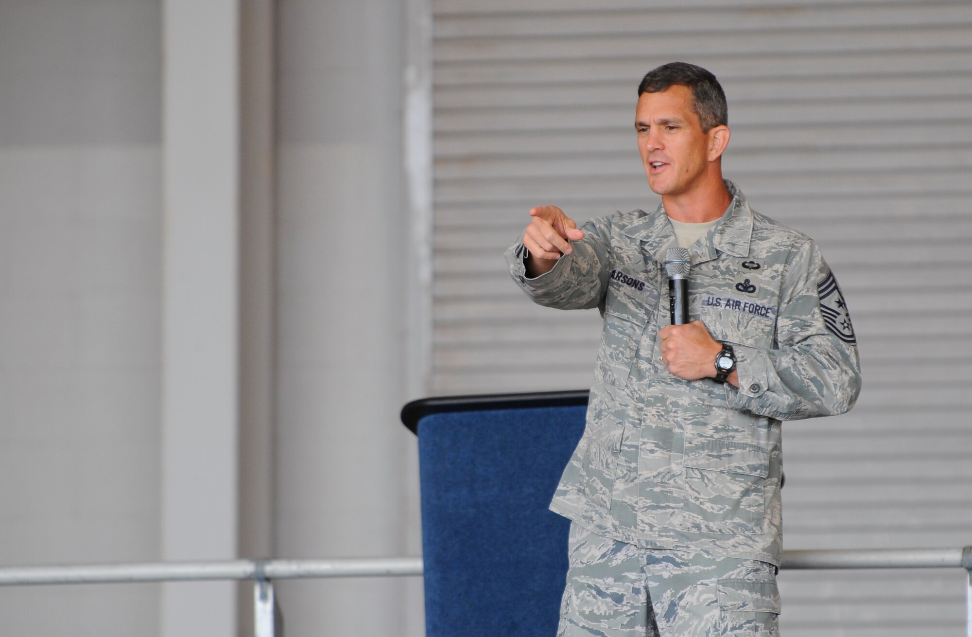 Chief Master Sgt. Richard Parsons, Air Combat Command command chief, briefs ACC Airmen stationed here and at Eglin Air Force Base, Fla., in the 15th Aircraft Maintenance Unit hangar on Hurlburt Field, Fla., Nov. 6, 2013. Parsons spoke about master sergeant promotion boards, the Developmental Special Duty Nomination and Selection process, and new enlisted performance report systems. (U.S. Air Force photo/Airman 1st Class Jeff Parkinson)