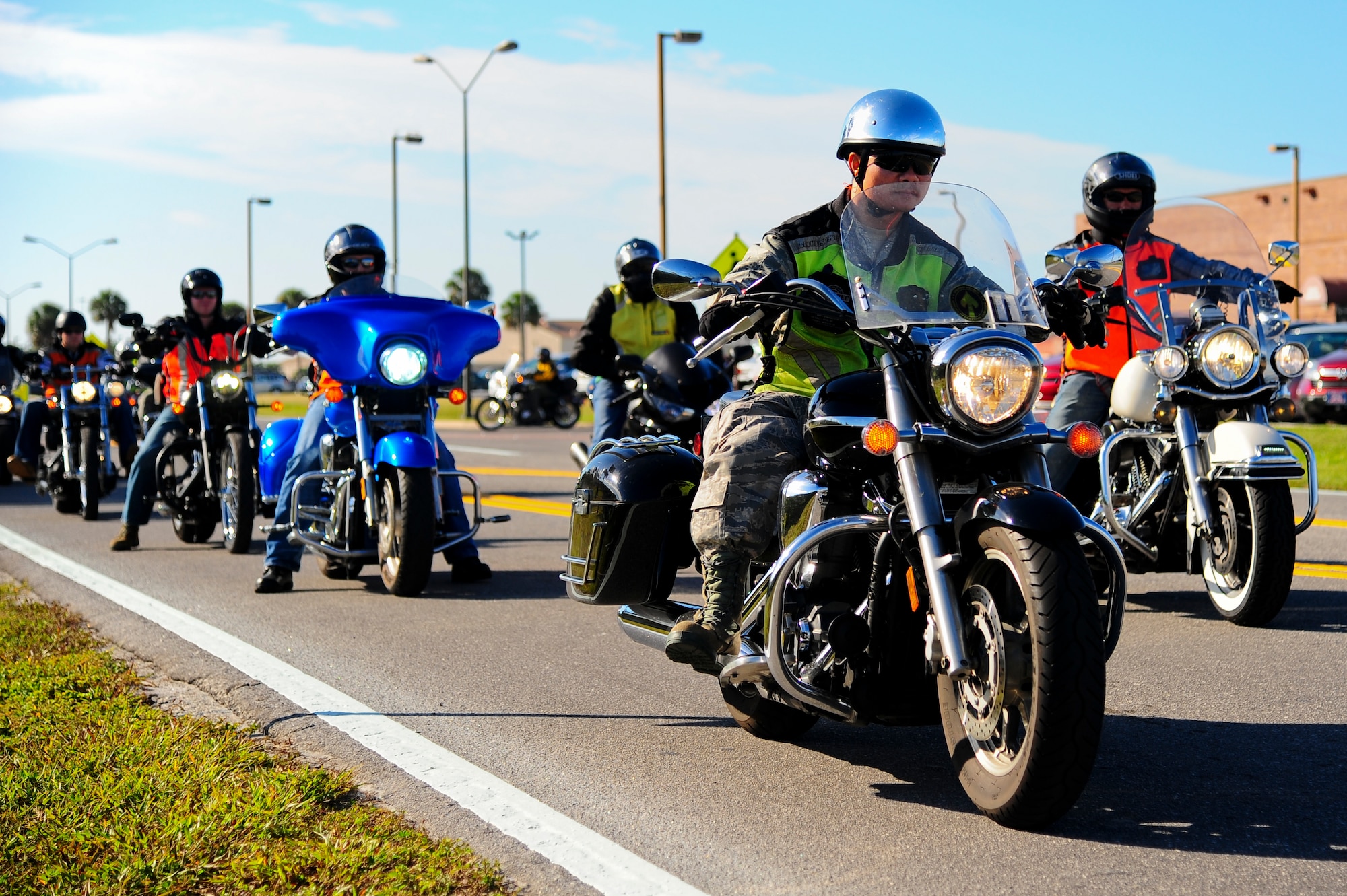 Members from MacDill Air Force Base, Fla., ride their motorcycles during a motorcycle safety, mentoring, and Combined Federal Campaign awareness ride Nov. 1, 2013. More than 60 members from MacDill came together to emphasize motorcycle safety, build camaraderie between members of Team MacDill and provide a kickoff event for the CFC. (U.S. Air Force photo by Airman 1st Class Ned T. Johnston/Released)