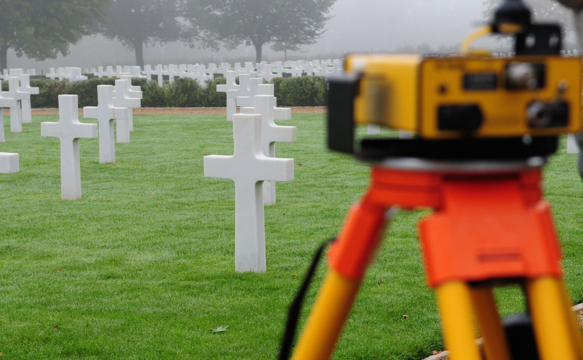 A radio is set up at one of three base stations around Madingley American Cemetery Oct. 16, 2013, at Madingley, near Cambridge, England, to measure points in longitude, latitude and elevation. Airmen from the 100th Civil Engineer Squadron engineering flight are working on a project to annotate the exact location of each of the 3,812 marble headstones. All the data from the project will be made into an electronic map that allows families and friends of those Americans lost in World War II to pinpoint the location of their resting place. (U.S. Air Force photo by Karen Abeyasekere/Released)