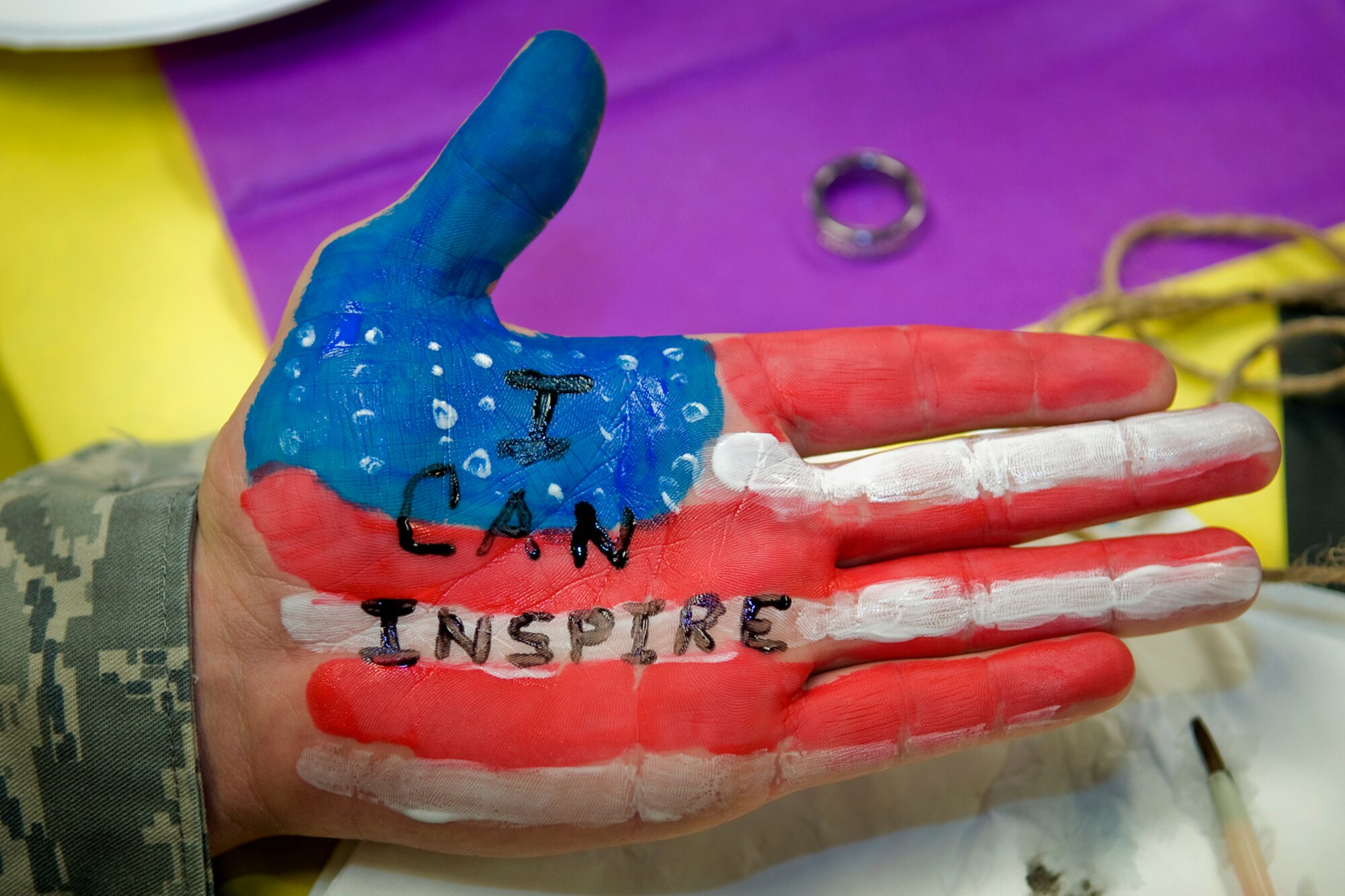 Staff Sgt. Richard D. Barrett IV, 434th Security Forces Squadron security response team member, displays his hand as part of an I Can project Oct. 17, 2013. Barrett, along with several other Grissom personnel participated in the event aimed at educating people on how they can take a stand against domestic violence. (U.S. Air Force photo/Tech. Sgt. Mark R. W. Orders-Woempner)
