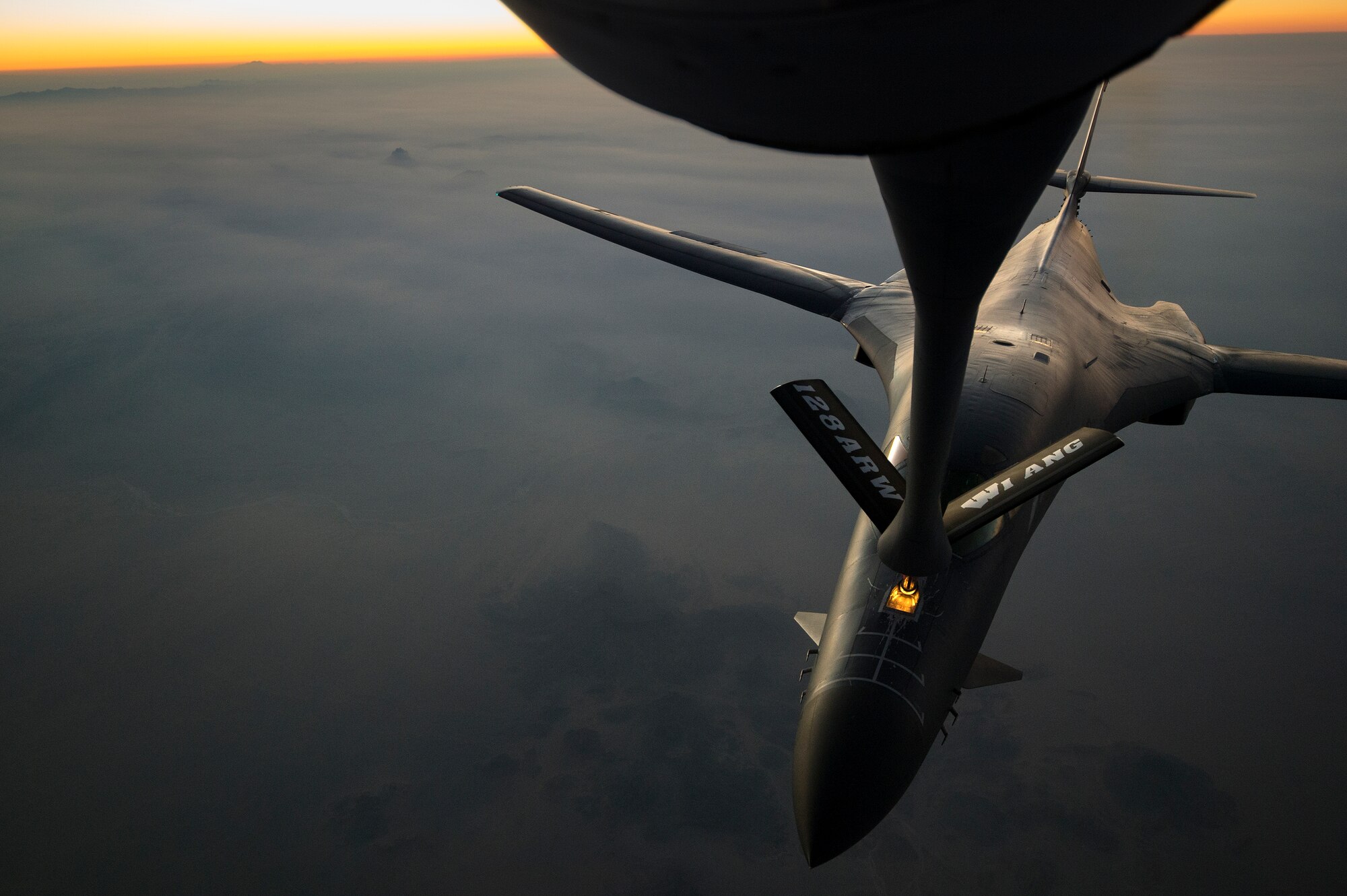Lt. Col. Sloan Hollis, 379th Expeditionary Operations Support Squadron commander and B-1B Lancer pilot, receives fuel from a KC-135R Stratotanker over Southern Afghanistan, Nov. 6, 2013. Sloan hails from Rapid City, S.D. The KC-135R is part of the 340th Expeditionary Air Refueling Squadron.
(U.S. Air Force Photo/Master Sgt. Ben Bloker)
