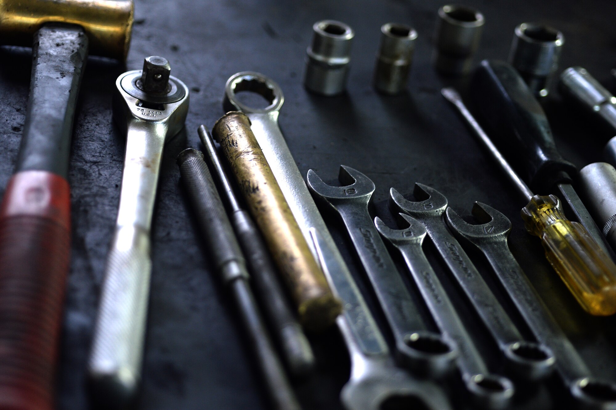 SPANGDAHLEM AIR BASE, Germany — Tools are set out to ensure accessibility in the repair of vehicles at the Spangdahlem Auto Hobby Center Nov. 7, 2013. The center repairs an average of 25 or more cars a week. (U.S. Air Force photo by Senior Airman Alexis Siekert/Released)