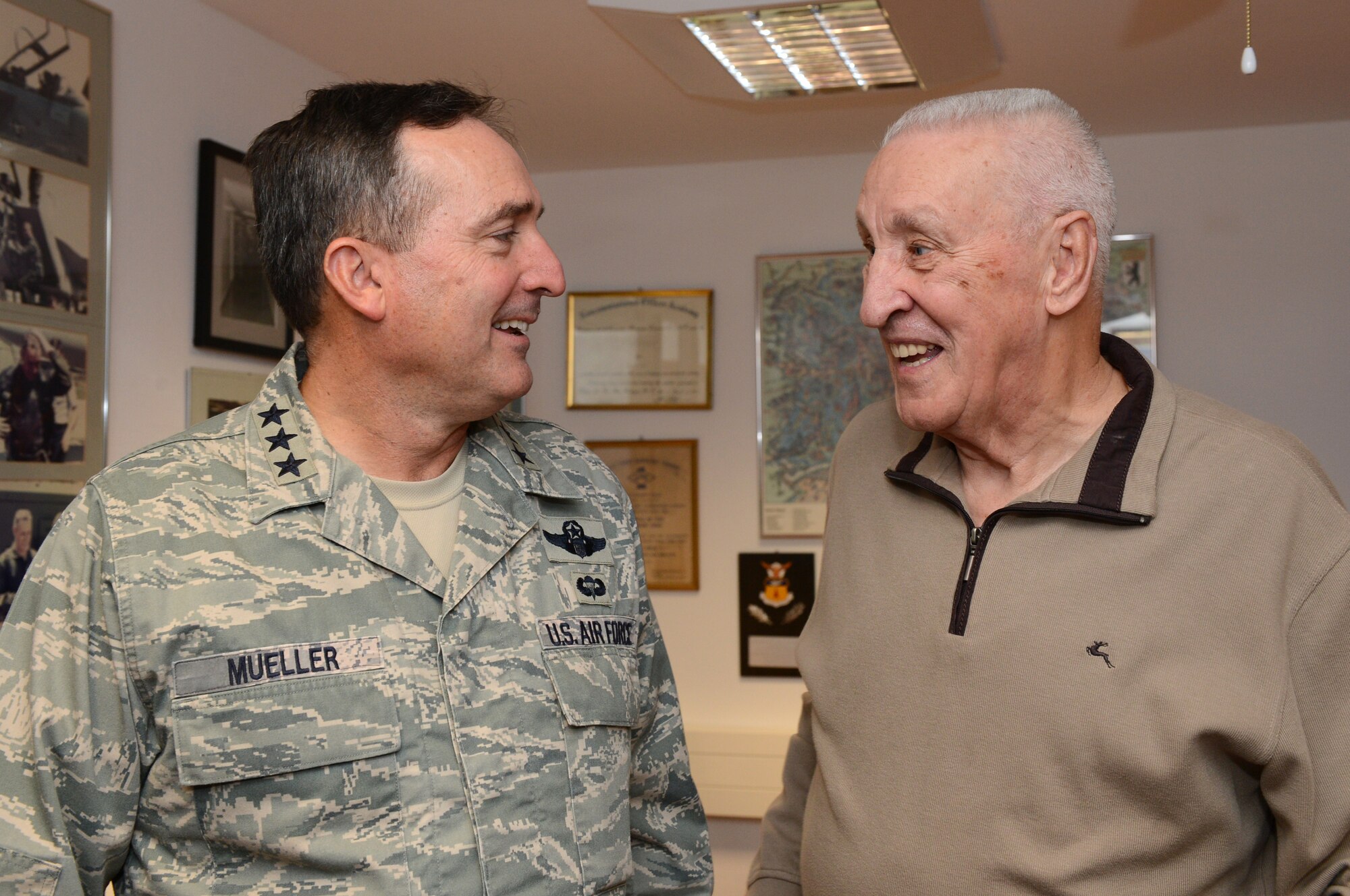 SPANGDAHLEM AIR BASE, Germany – Lt. Gen. Stephen Mueller, U.S. Air Force inspector general, visits with George Price, 52nd Force Support Squadron special events coordinator, Nov. 5, 2013. Price previously worked with Mueller when he was the 52 Fighter Wing commander in 2002.  (U.S. Air Force photo by Airman 1st Class Kyle Gese/Released)