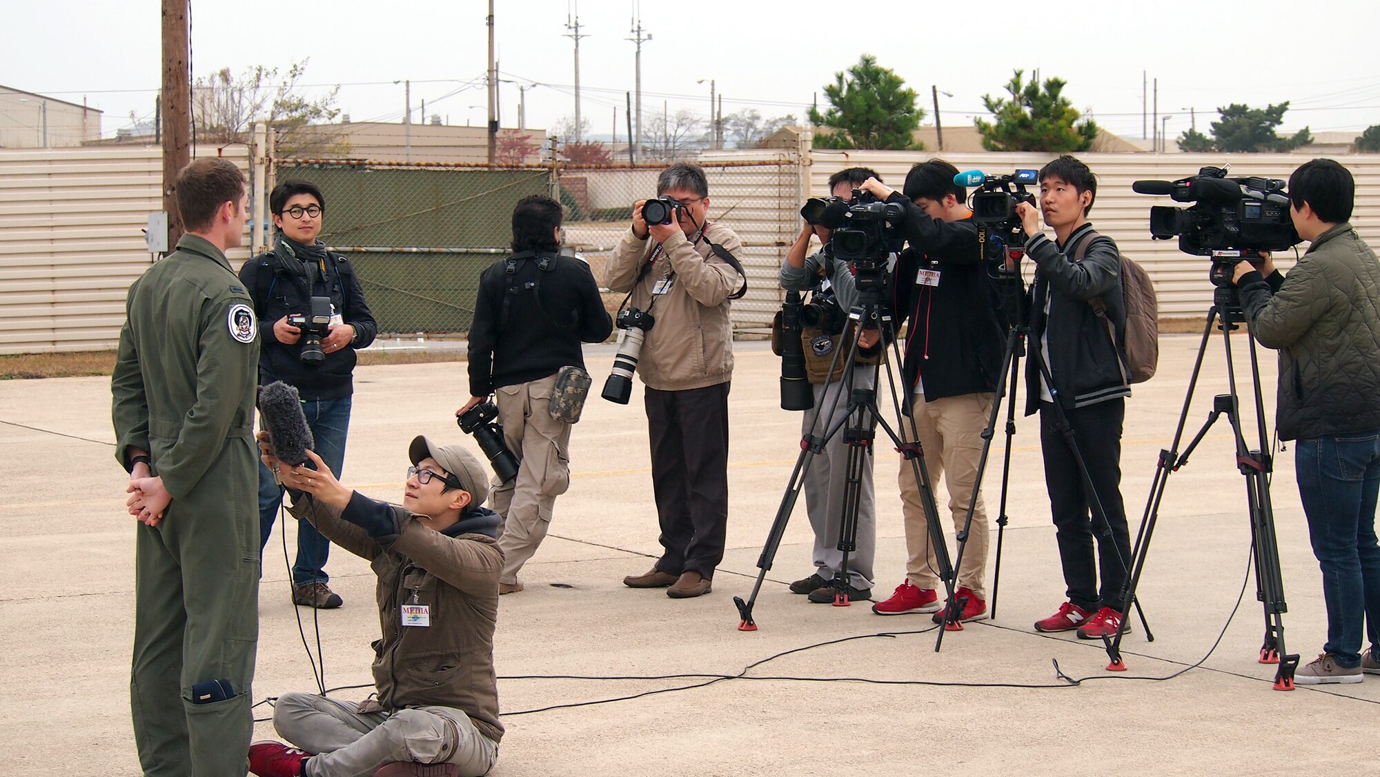 KUNSAN AIR BASE, Republic of Korea – Air Force 1st Lt. Billy Baker, 80th Fighter Squadron F-16 pilot, is interviewed by journalists during the Exercise Max Thunder media day on Kunsan Air Base, Republic of Korea Nov. 6. Max Thunder integrates U.S. and ROK forces to train on close air support missions to ensure mutual understanding and trust between the two nations. The exercise enhances the readiness of U.S. and ROK forces to defend the Republic of Korea  and sustain the capabilities which strengthen the ROK-U.S. Alliance. (U.S. Air Force photo by Tech. Sgt. Thomas J. Doscher)