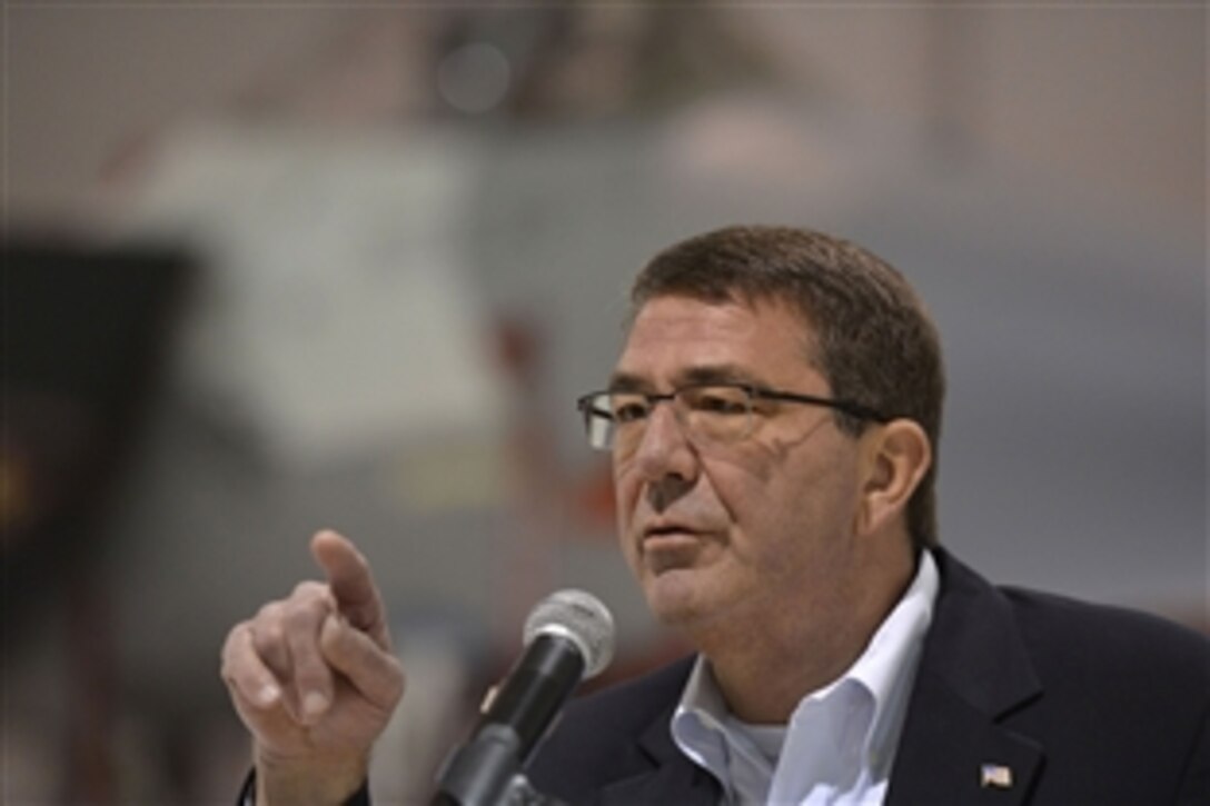 Deputy Defense Secretary Ash Carter delivers remarks to troops at Thunderbirds hangar on Nellis Air Force Base, Nev., Nov. 6, 2013.  
