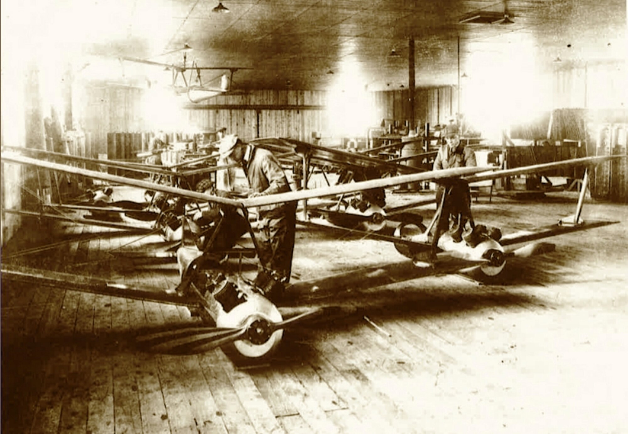 Workers assemble the “Liberty Eagle” aircraft at a factory in 1918.  

