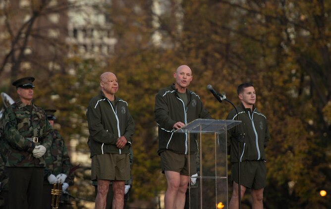 The Sgt. Maj. of the Marine Corps Micheal P. Barrett gives a motivational speech to Marines from Joint Base Myer-Henderson Hall and the Pentagon after a mile and a half run to the Marine Corps Memorial in Arlington, Va. Nov. 8, 2013. Barrett highlighted actions taken by Sgt. Isaac Gallegos and Cpl. Kyle Carpenter. (U.S. Marine Corps photo by Cpl. Melissa Karnath/Released)