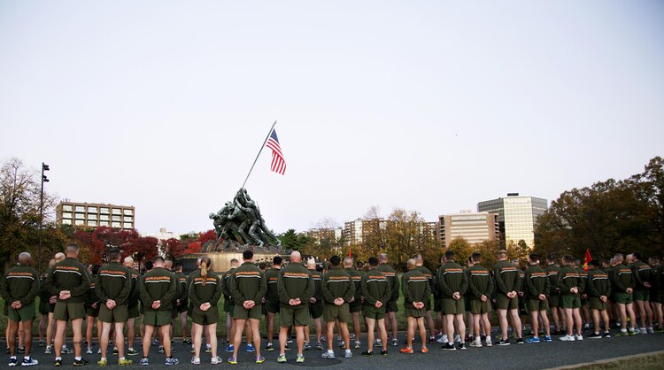 Marines from Joint Base Myer-Henderson Hall and the Pentagon stand in formation after running to the Marine Corps Memorial in Arlington, Va. Nov. 8, 2013, in commemoration of the Corps' upcoming 238th birthday Nov. 10.  The Sgt. Maj. of the Marine Corps Micheal P. Barrett applauded the Marines for being part of an all-volunteer force before leading the singing of the Marines' Hymn. (U.S. Marine Corps photo by Pfc. Preston McDonald/Released)