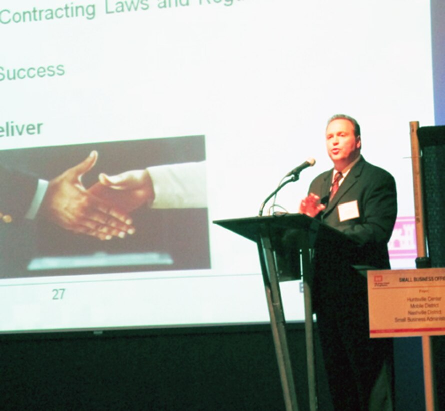 John Mayes, Director of Huntsville Center’s Contracting Directorate gives acquisition briefing during the information session at the forum.