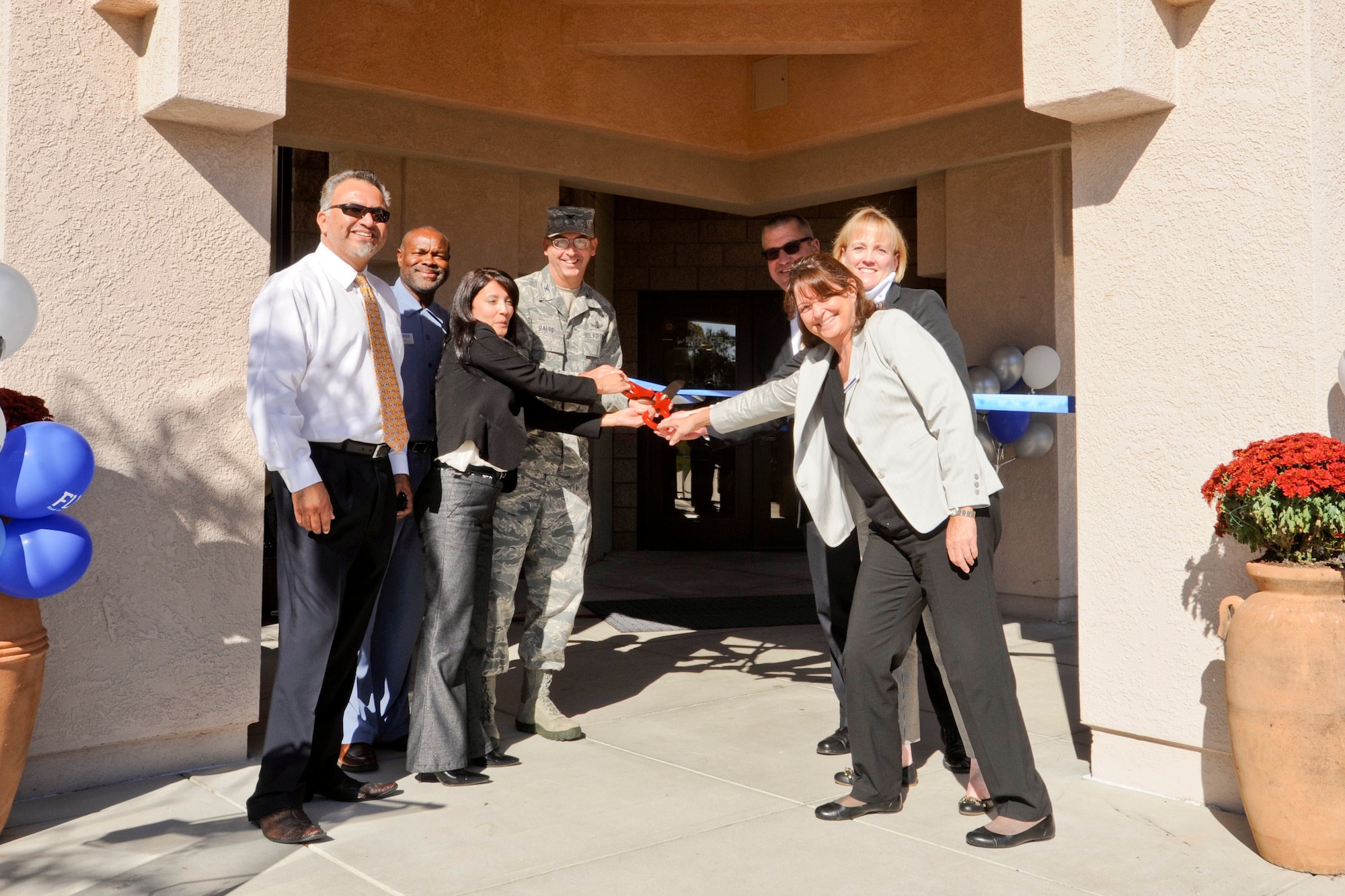 VANDENBERG AIR FORCE BASE, Calif. - Col. Keith Balts, 30th Space Wing commander, and other key personnel involved with the food transformation project, cut the ribbon for the grand opening of the Breakers Base Restaurant here Nov. 8, 2013. (U.S. Air Force photo/ Airman 1st Class Yvonne Morales)
