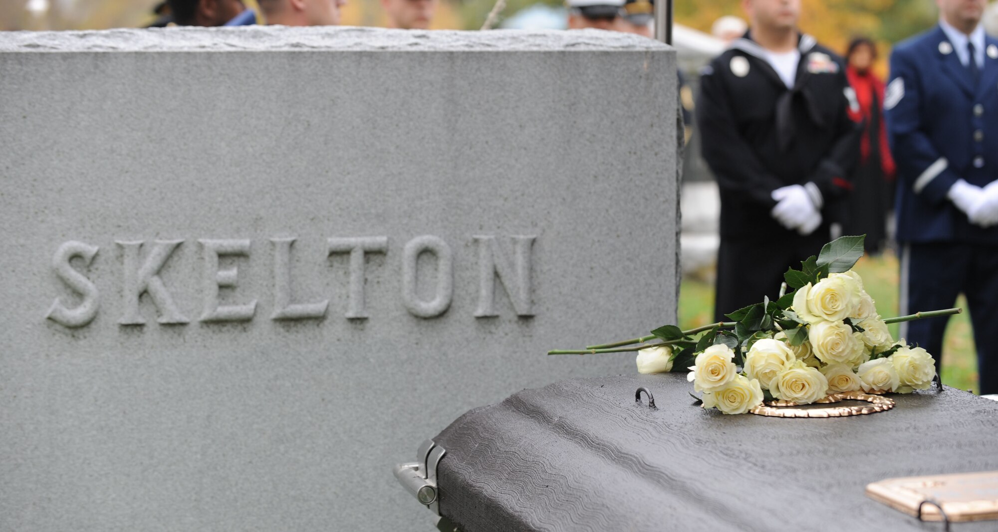 White roses are placed on Ike Skelton’s casket during his funeral at Lexington, Mo., Nov. 4, 2013. Ike Skelton passed away Oct. 28, 2013, from pneumonia. (U.S. Air Force photo by Staff Sgt. Alexandra M. Boutte/Released)