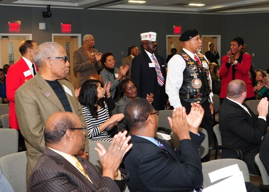 Vietnam War veterans stand to be recognized during the Veterans History Project Reception on Joint Base Andrews, Md., Nov. 8, 2013. (U.S. Air Force photo/Airman 1st Class Aaron Stout) 
