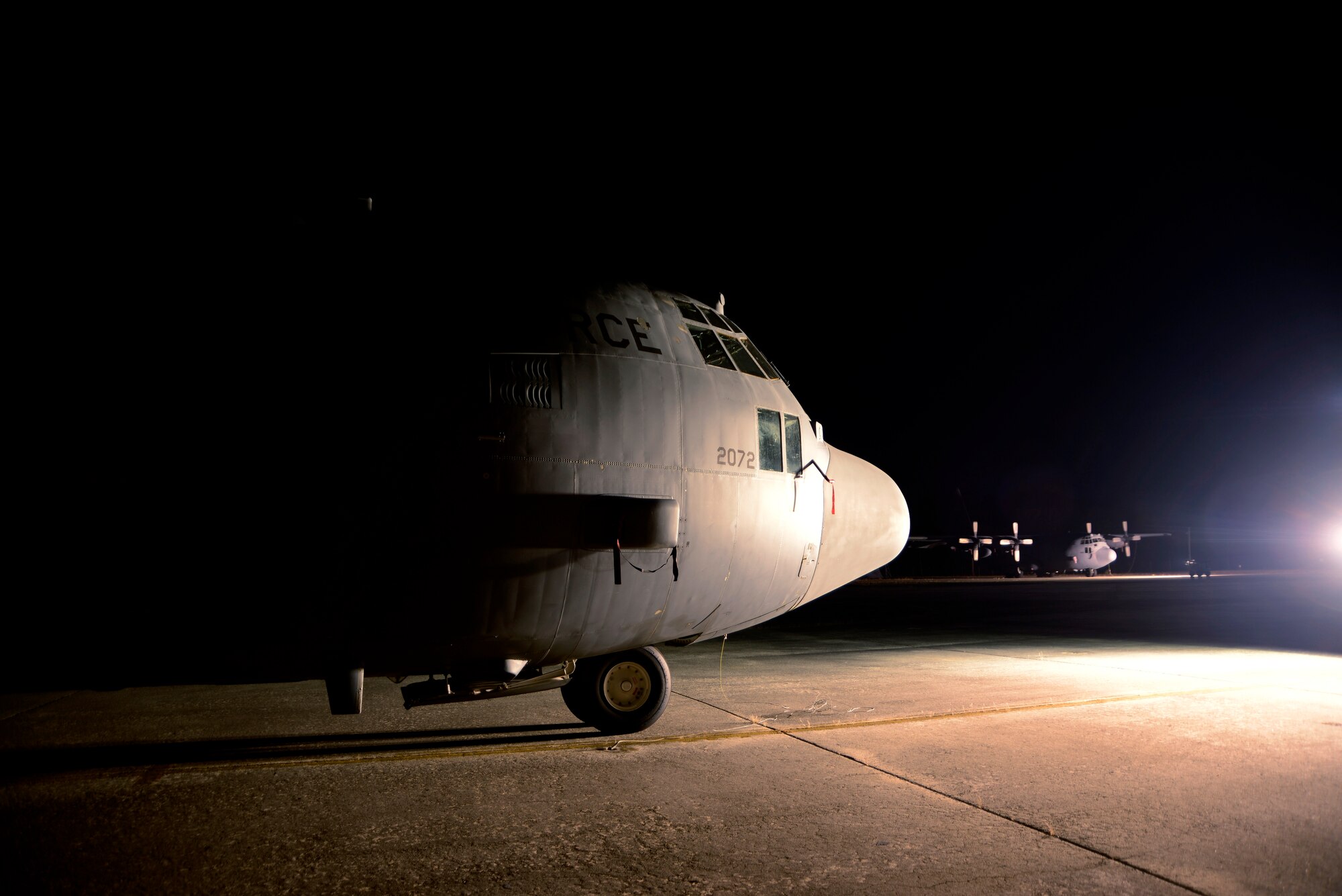 Two C-130H aircraft will take part in an unique mission at Robins in the next several months, which will benefit the Afghan Air Force. One of the aircraft suffered major structural damage to its nose as a result of a hard landing. Once repaired at Robins, it will be one of two C-130s that will be delivered to Afghanistan in 2014. A second parked C-130H is being used as a donor aircraft to aid with repairs to the first aircraft’s damaged nose, according to Jim Russell, 560th Aircraft Maintenance Squadron director. In an Oct. 25 “Robins Rev-Up” article, Russell said the nose swap “will be a huge structural undertaking that will require tremendous teamwork between C-130 maintainers and system program office engineers.” This upcoming nose repair will be an unscheduled depot level maintenance action, which will also require a corrosive prevention compound application, marking of Afghan symbols and a minor inspection to ensure air worthiness. (U.S. Air Force photo by Ed Aspera) 
