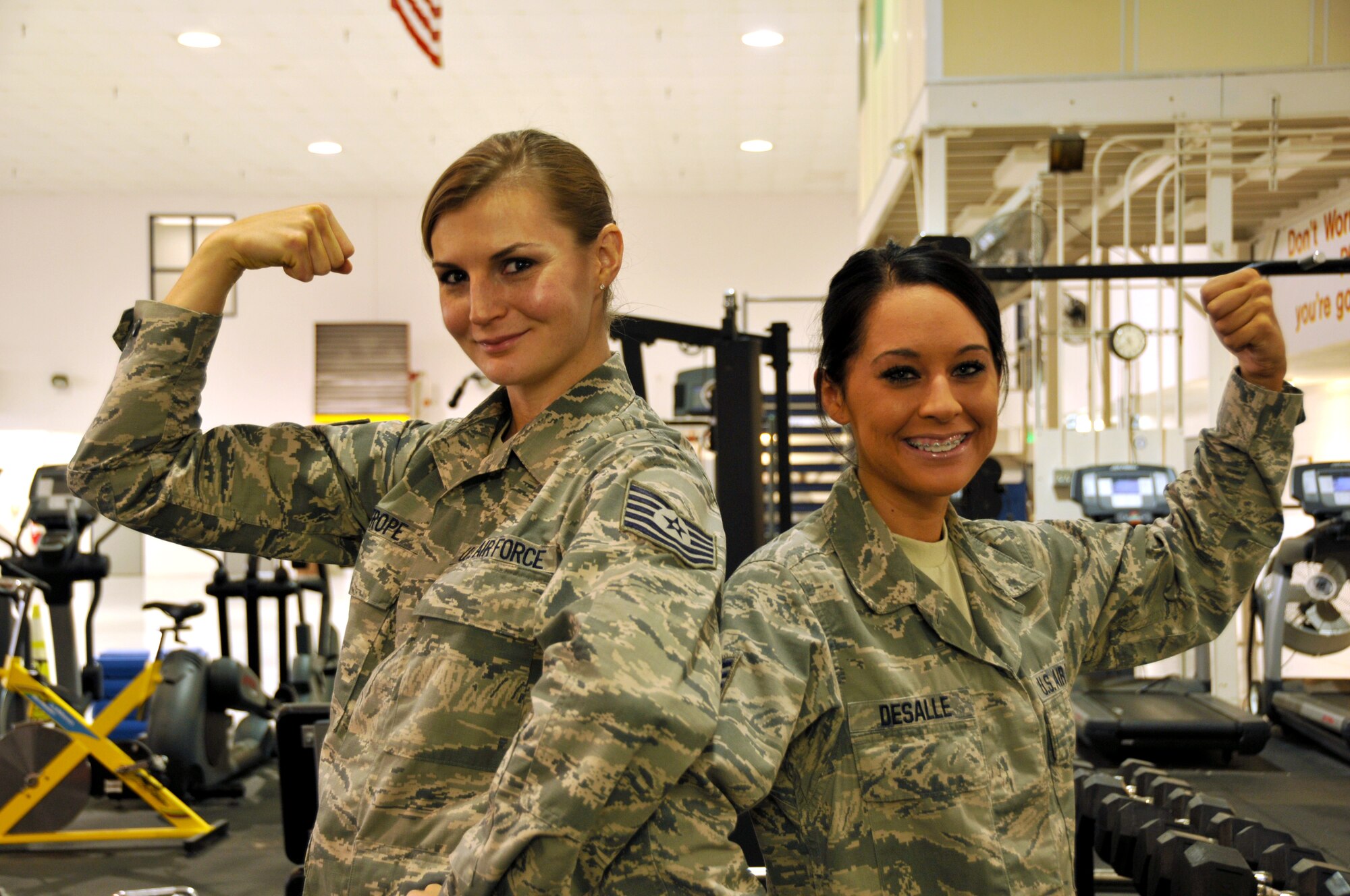 Tech. Sgt. Emily Strope and Staff Sgt. Emily DeSalle recently compteted and placed in the NPC Monster Mash Natural body building competition Oct. 26 in Harrison, Ohio. U.S. Air Force Photo by Tech. Sgt. Patrick O'Reilly. released