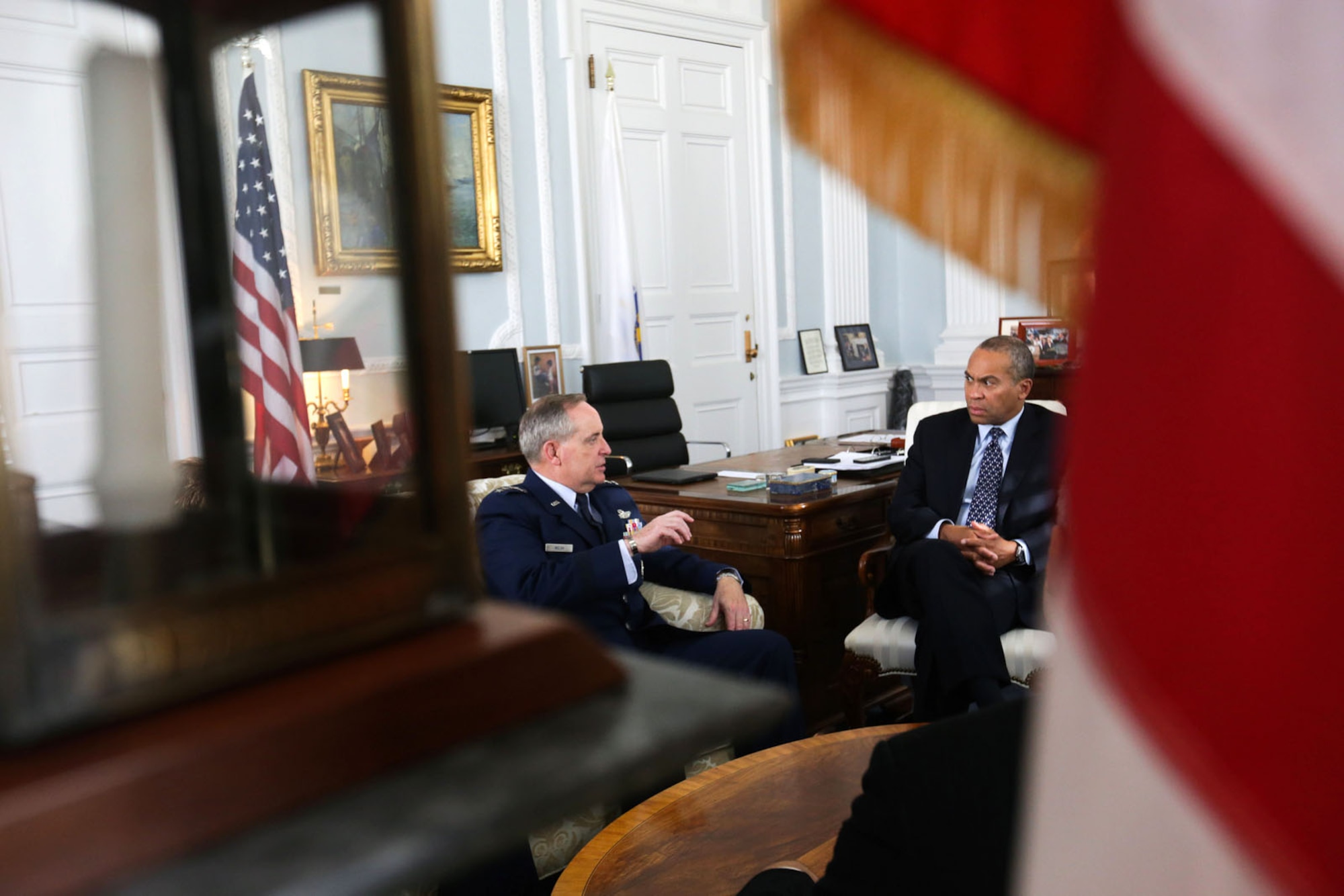 BOSTON -- Gov. Deval Patrick greets U.S. Air Force Chief of Staff Gen. Mark A. Welsh III and Massachusetts delegation members during the Hanscom Collaboration Forum in the Governor's office. (Photo: Grace Donnelly/Governor's Press Office)