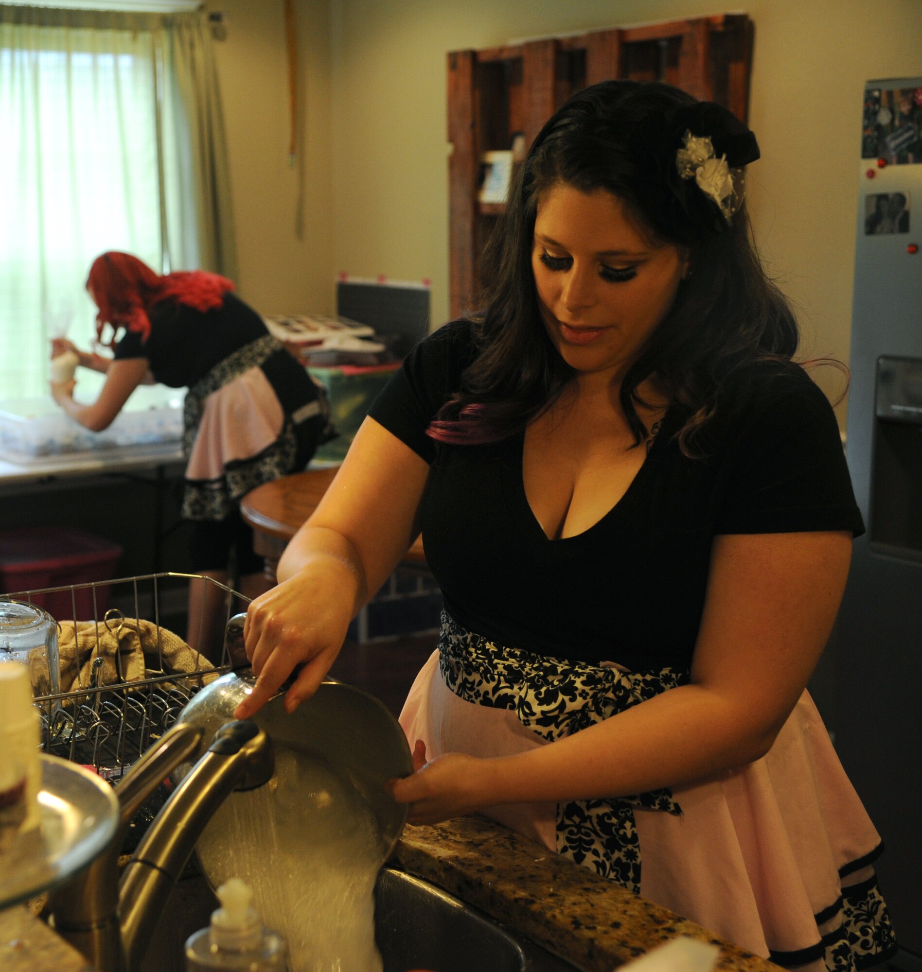 Alyssa Wurtz, cupcake caterer, cleans a mixing bowl Oct. 28, 2013, in Ward, Ark. Wurtz and her business partner, Jacie Adams, have been working together since 2011. (U.S. Air Force photo by Airman 1st Class Harry Brexel)