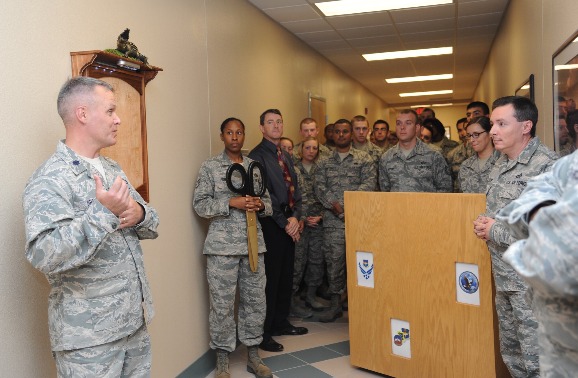 Lt. Col. Kevin Bray, 334th Training Squadron commander, says a few words during a 334th Training Squadron command post apprentice course re-dedication ceremony Nov. 7, 2013, at Cody Hall, Keesler Air Force Base, Miss.  The course and simulator equipment was moved from Bryan Hall to Cody Hall after room modifications were made by the Trainer Maintenance and Trainer Development Center.  (U.S. Air Force photo by Kemberly Groue)